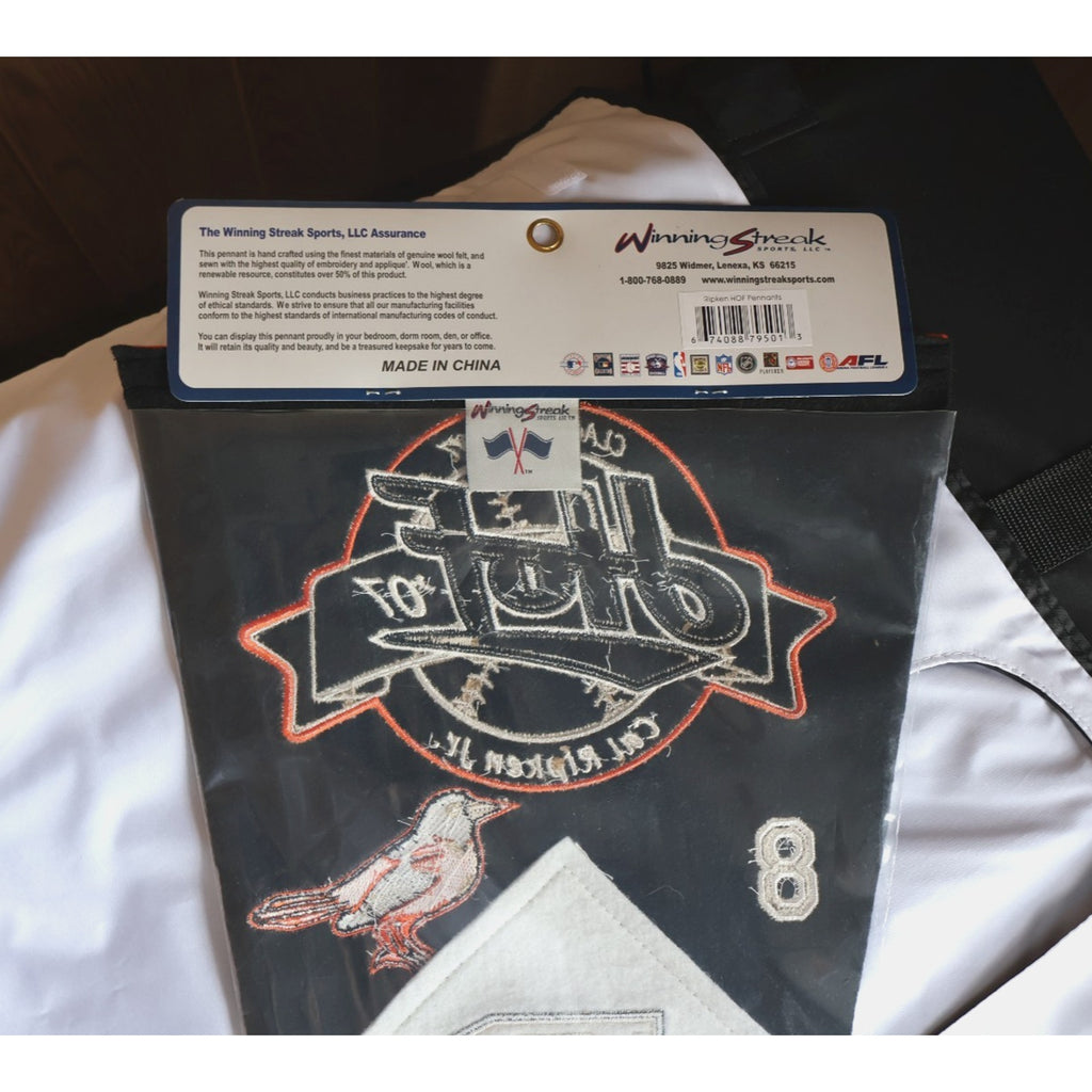 Packaging header and officially licensed branding attached to the pennant