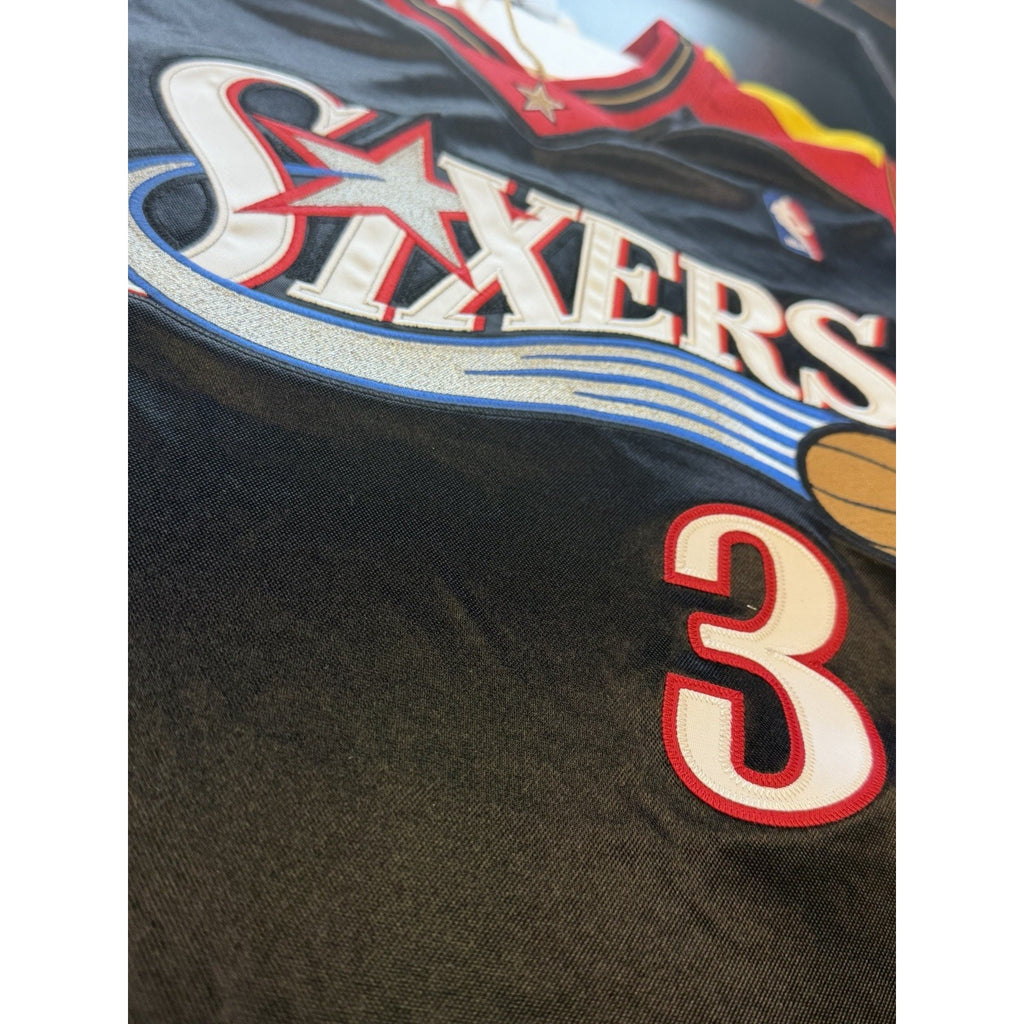 Close-up of Allen Iverson signature on Philadelphia 76ers Black Alternate Hardwood Classics jersey