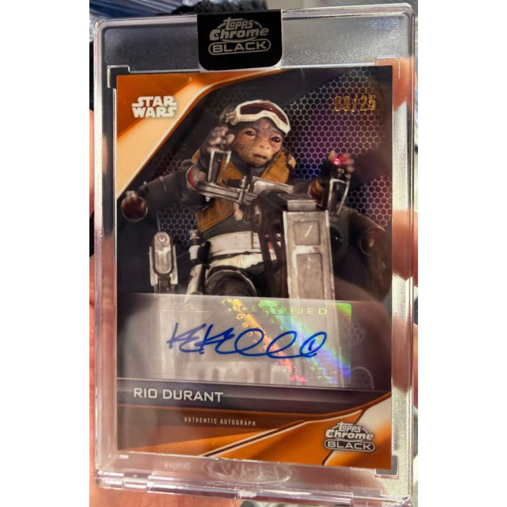 Close-up of certified autograph on 2025 Topps Chrome Black Star Wars Rio Durant Orange Refractor numbered to 25