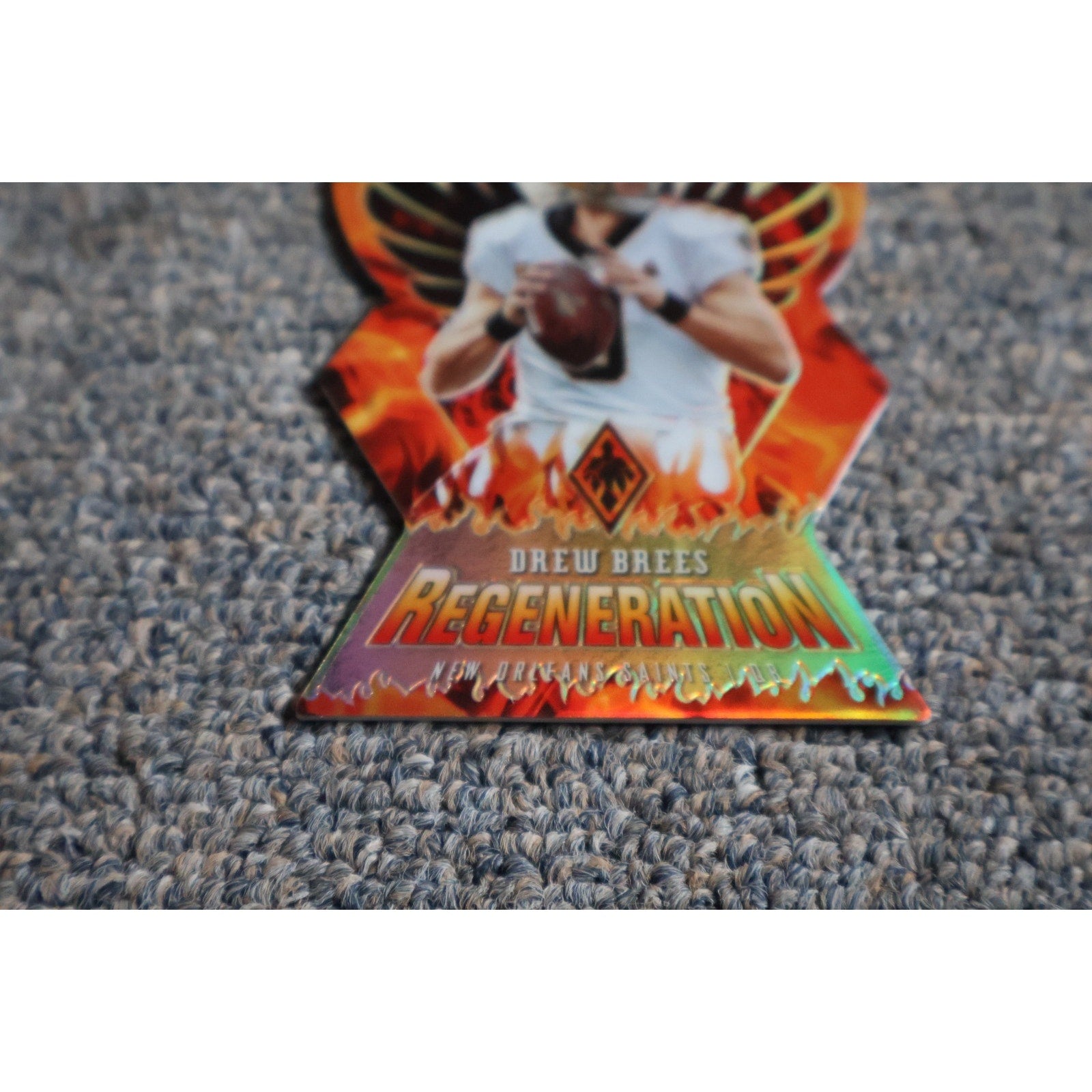 Angled front view of Drew Brees Panini Phoenix Regeneration case hit trading card