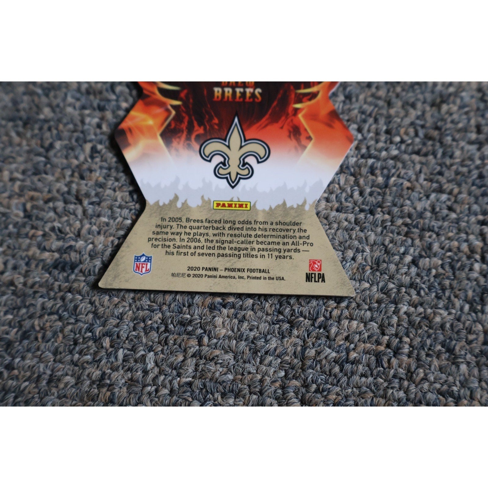 Lower angle view of 2020 Panini Phoenix Drew Brees Regeneration #7 collectible card