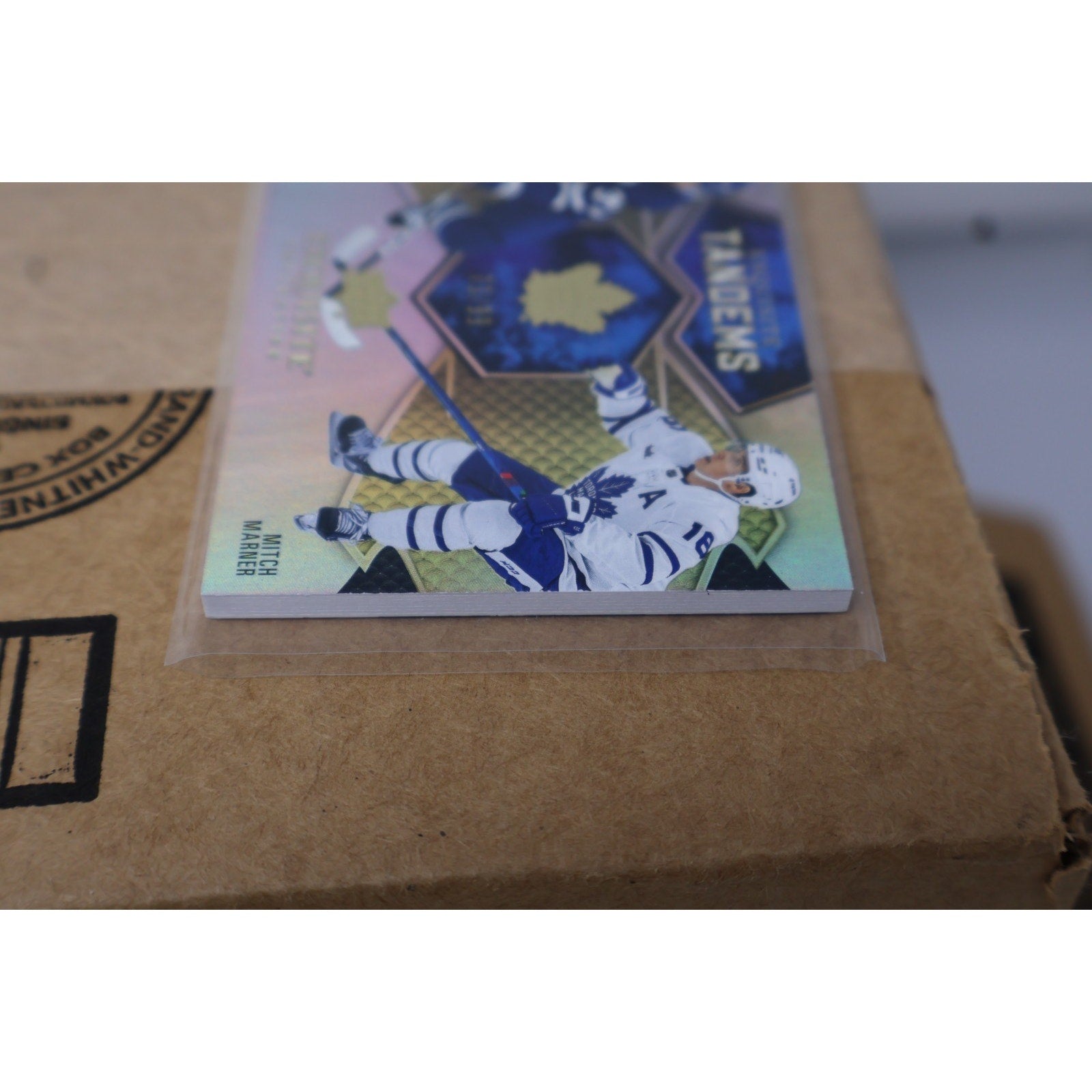 Angled front display of Matthews and Marner Exquisite Tandems Gold card