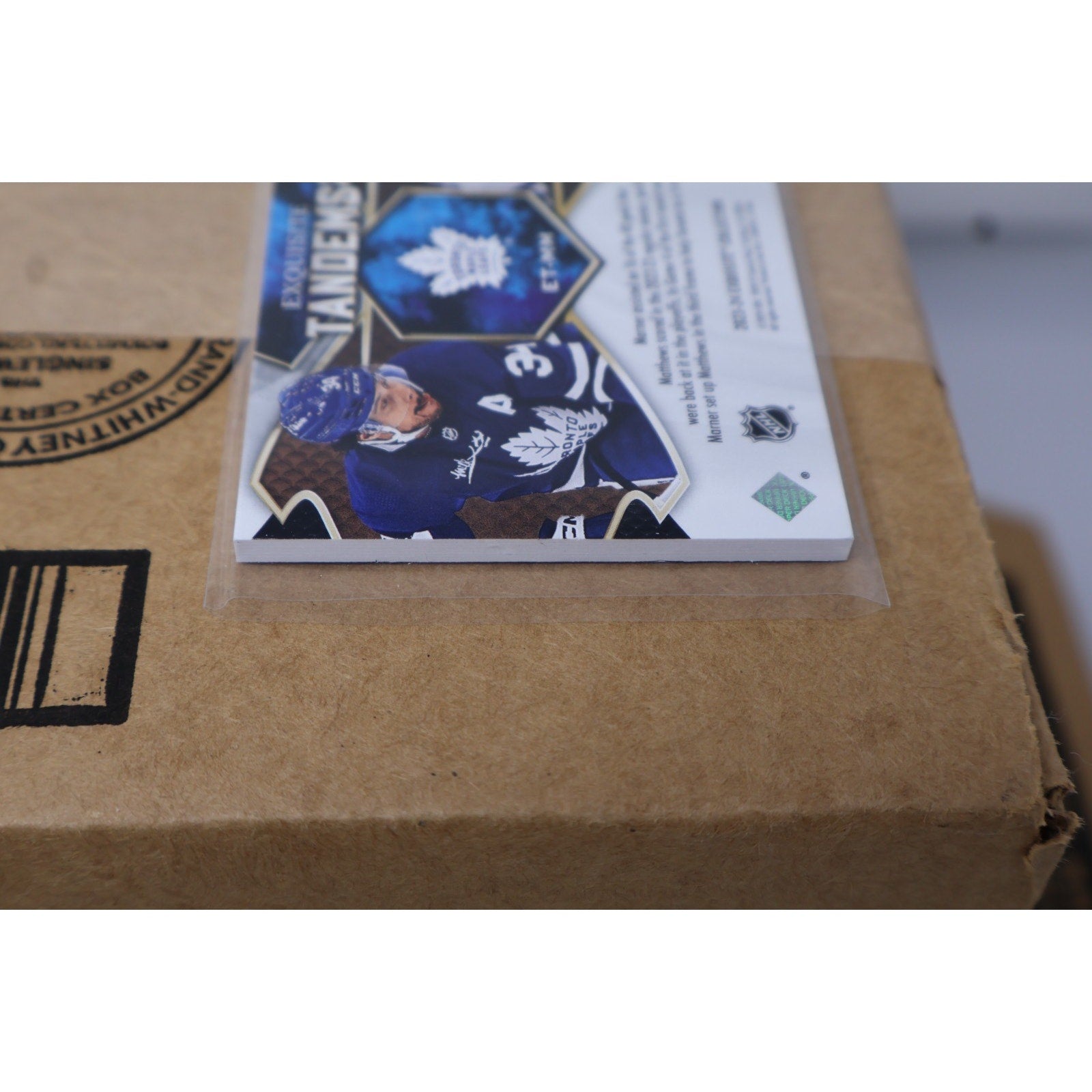 Detailed foil finish view of Matthews and Marner tandem hockey card