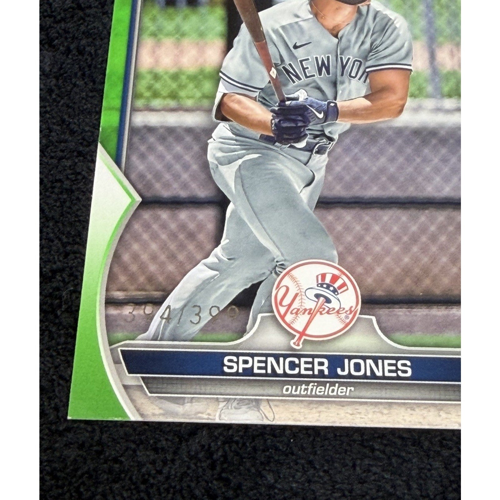 2023 Bowman Prospects Spencer Jones #BP-139 Neon Green /399 card angled front view showcasing serial-numbered parallel finish