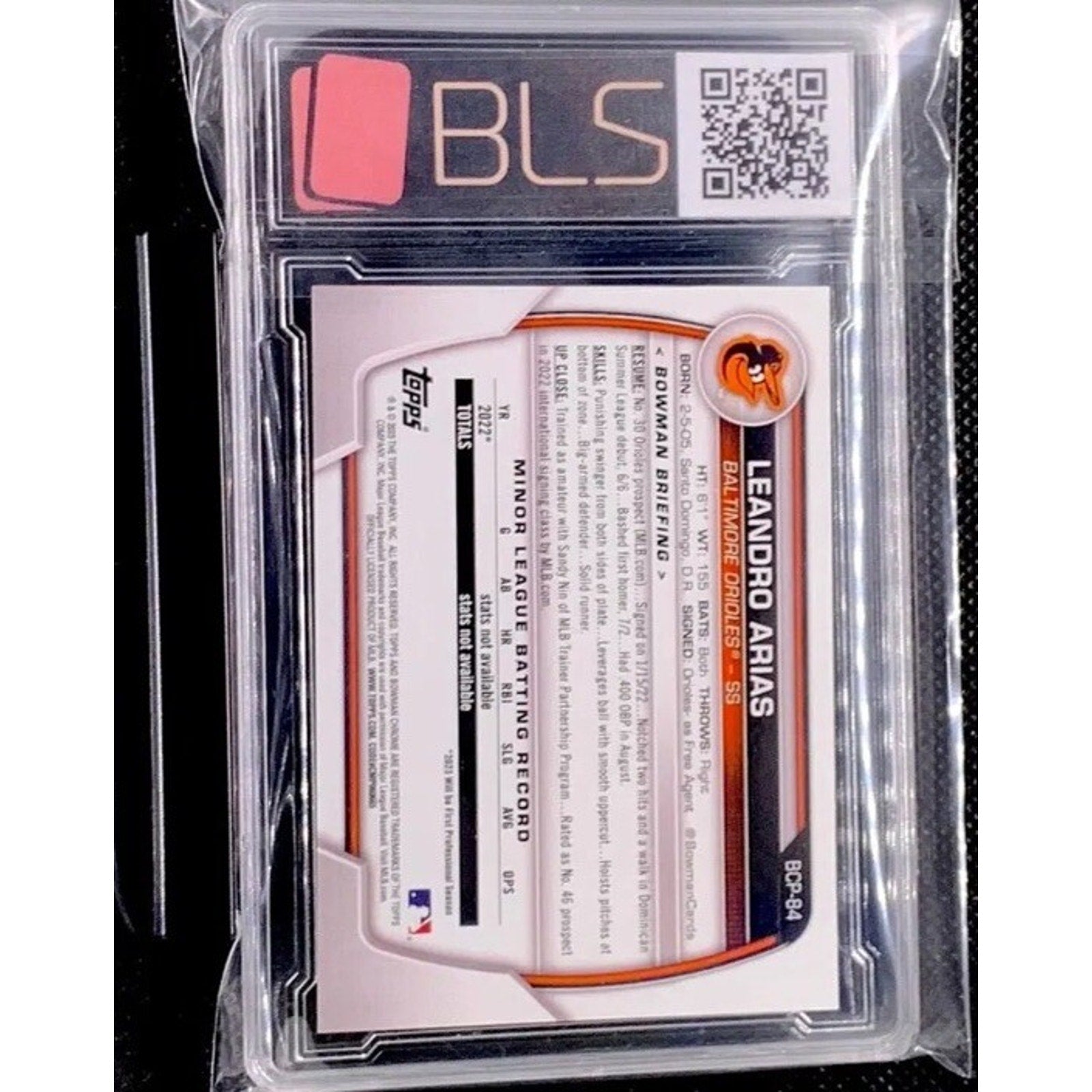 Back view of 2023 Bowman Chrome Leandro Arias Fuschia Refractor #BCP-84 graded BLS 10 GEM