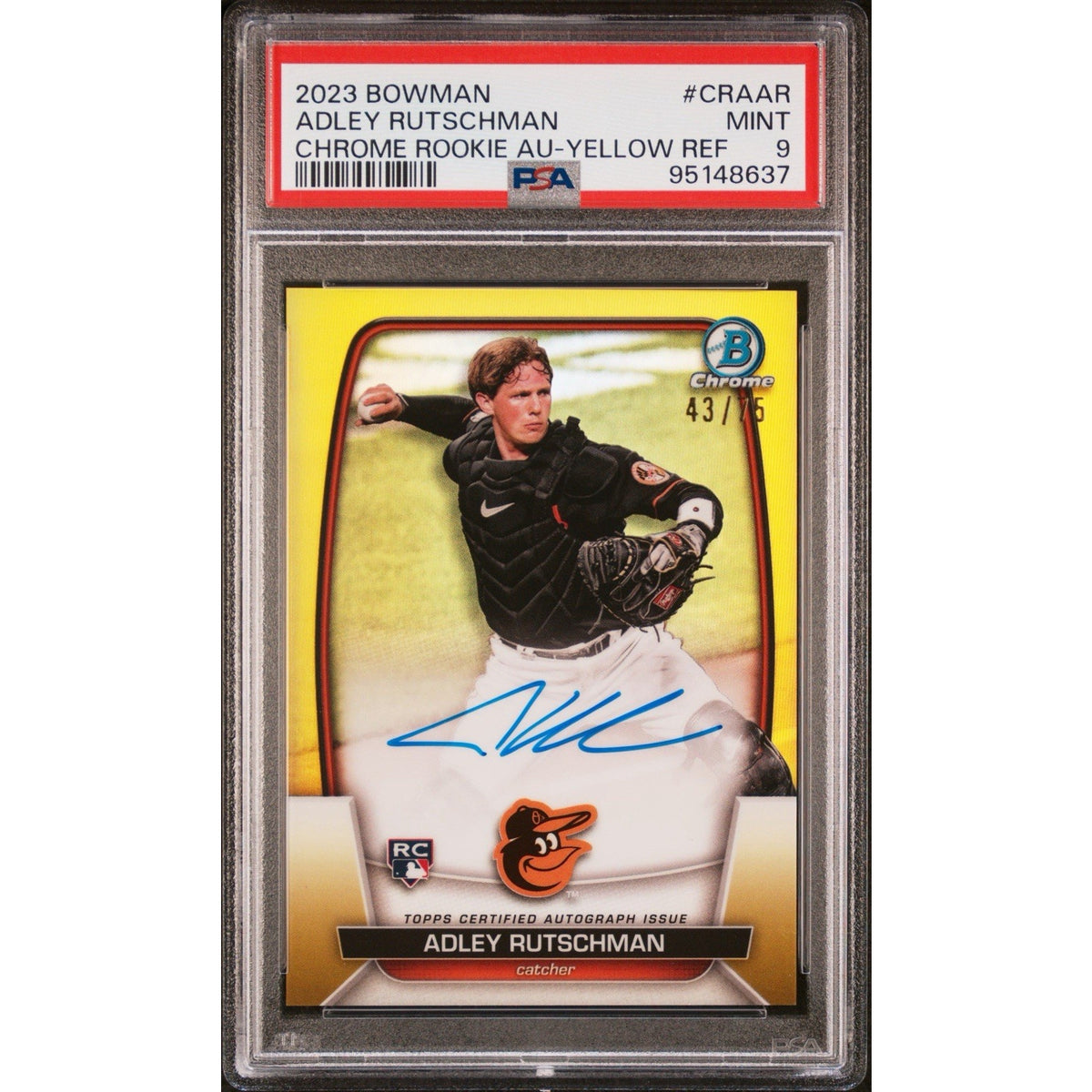 Front view of a PSA 9 graded 2023 Bowman Chrome Adley Rutschman Yellow Refractor Rookie Autograph card numbered /75, featuring the Baltimore Orioles catcher and blue on-card autograph