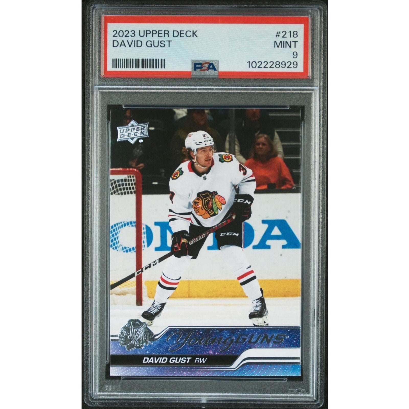 2023 Upper Deck Young Guns David Gust rookie card #218 PSA 9 front view Chicago Blackhawks