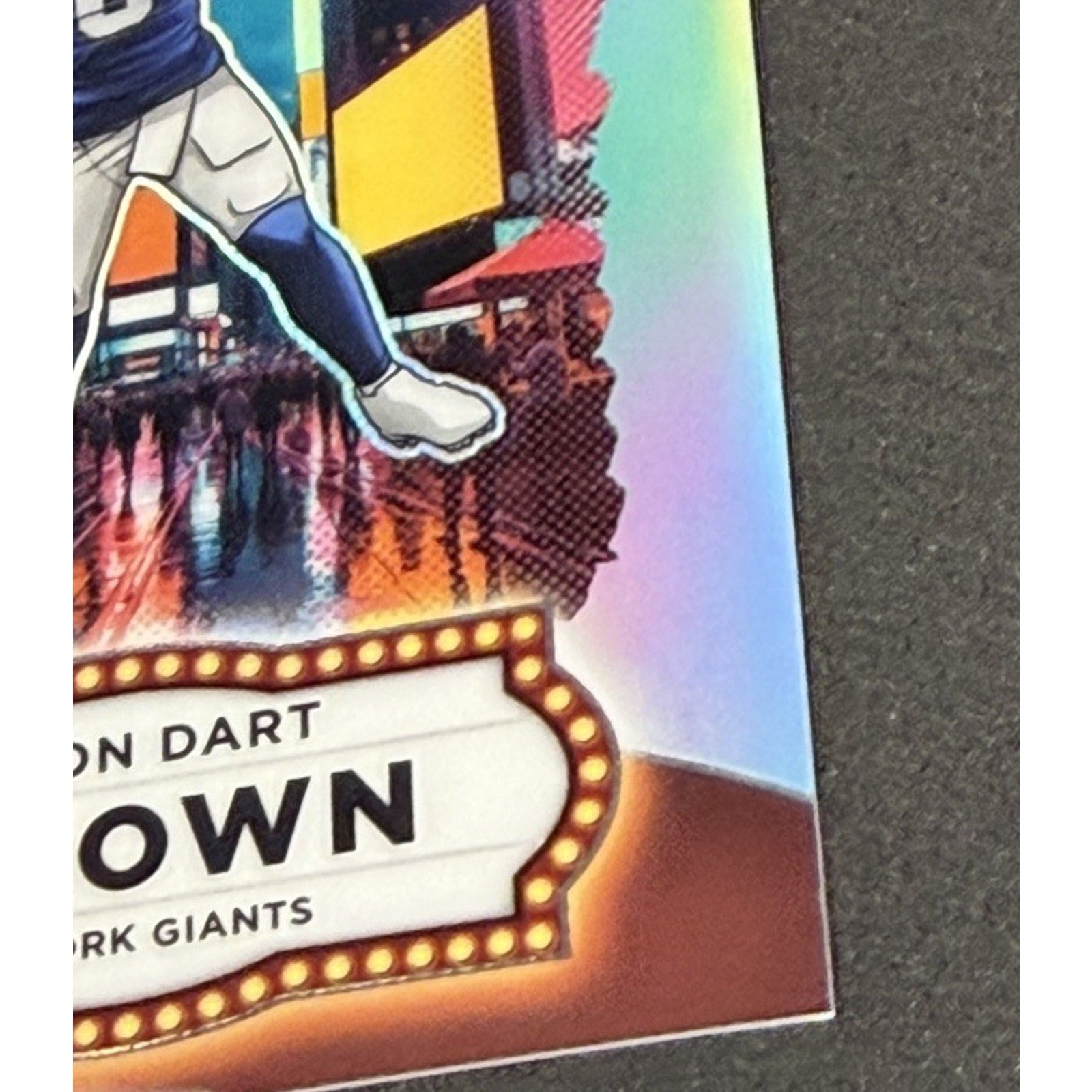 Colorful trading card with a character and text on a dark background