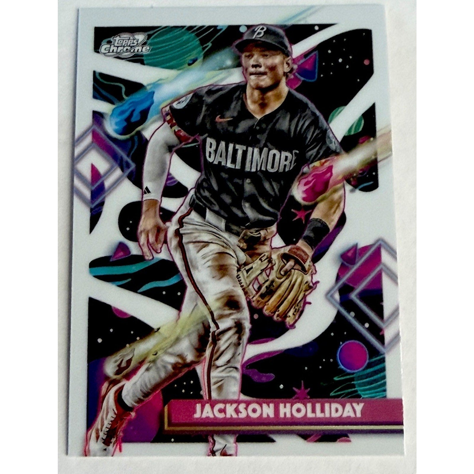 Baseball trading card of Jackson Holliday with colorful abstract background