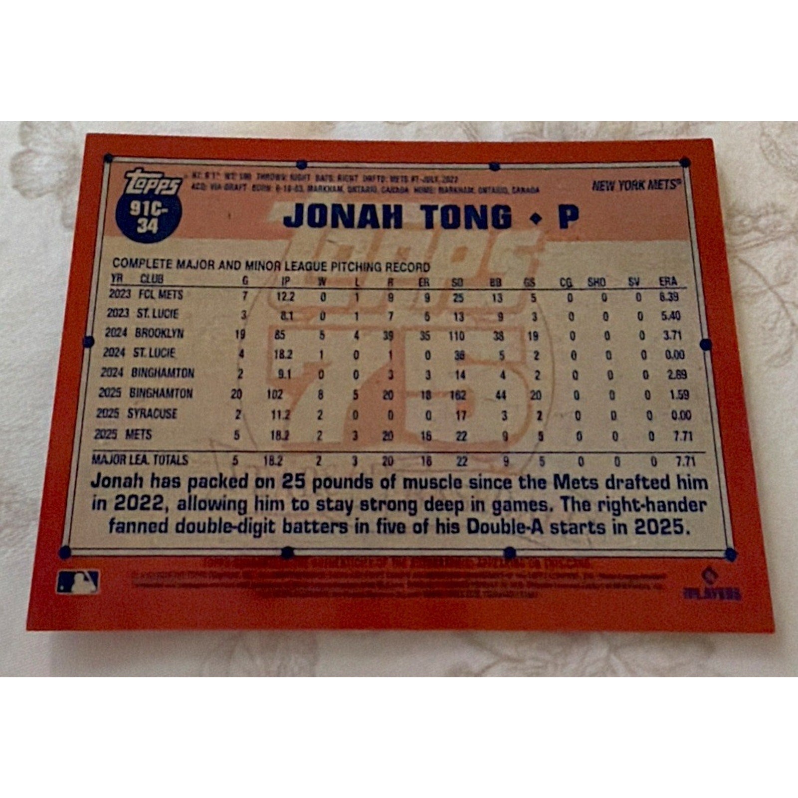 Back view of 2026 Topps Series 1 Jonah Tong Mojo Gold Refractor rookie autograph card
