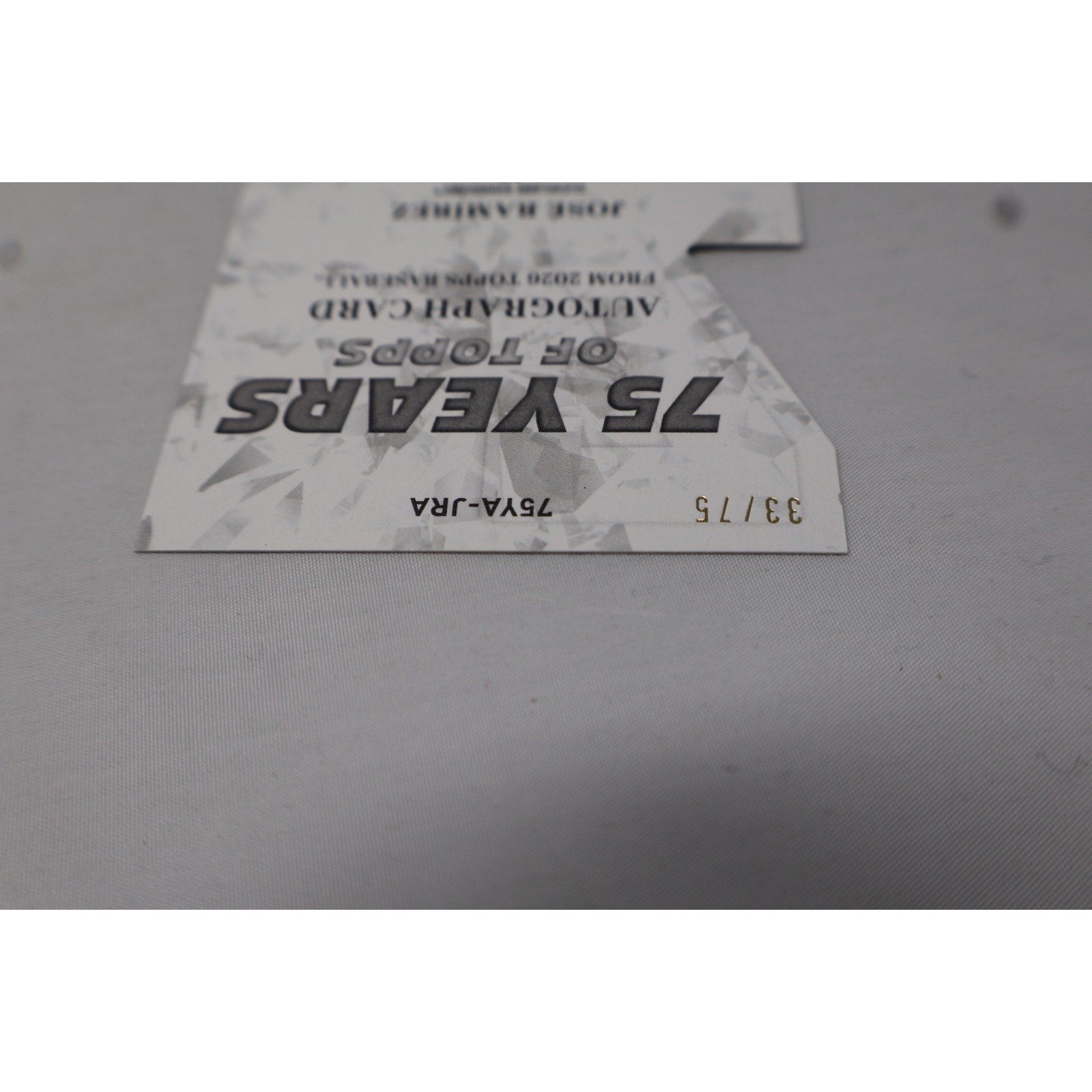 Close-up of the card edge and serial numbering area, showing limited-edition production details.