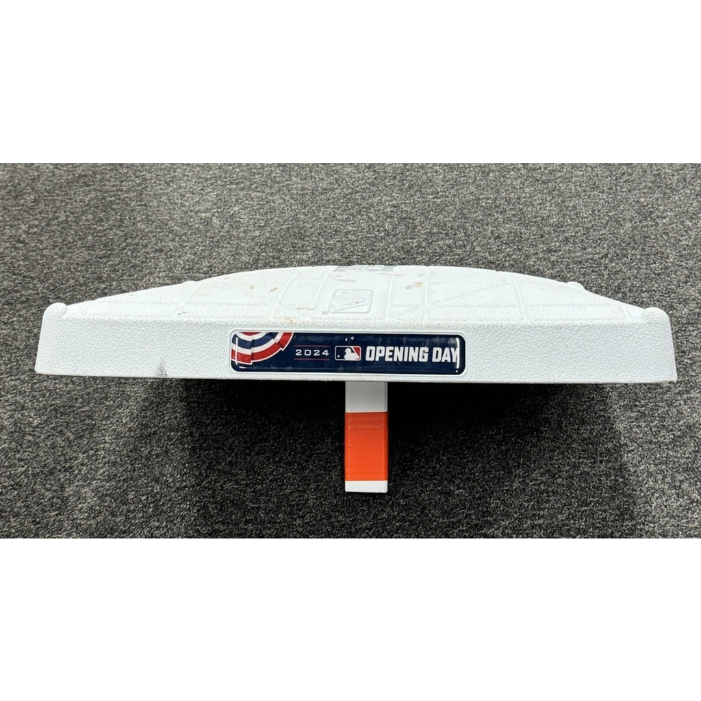 Side profile view of 2024 Orioles Opening Day game used third base with display stand