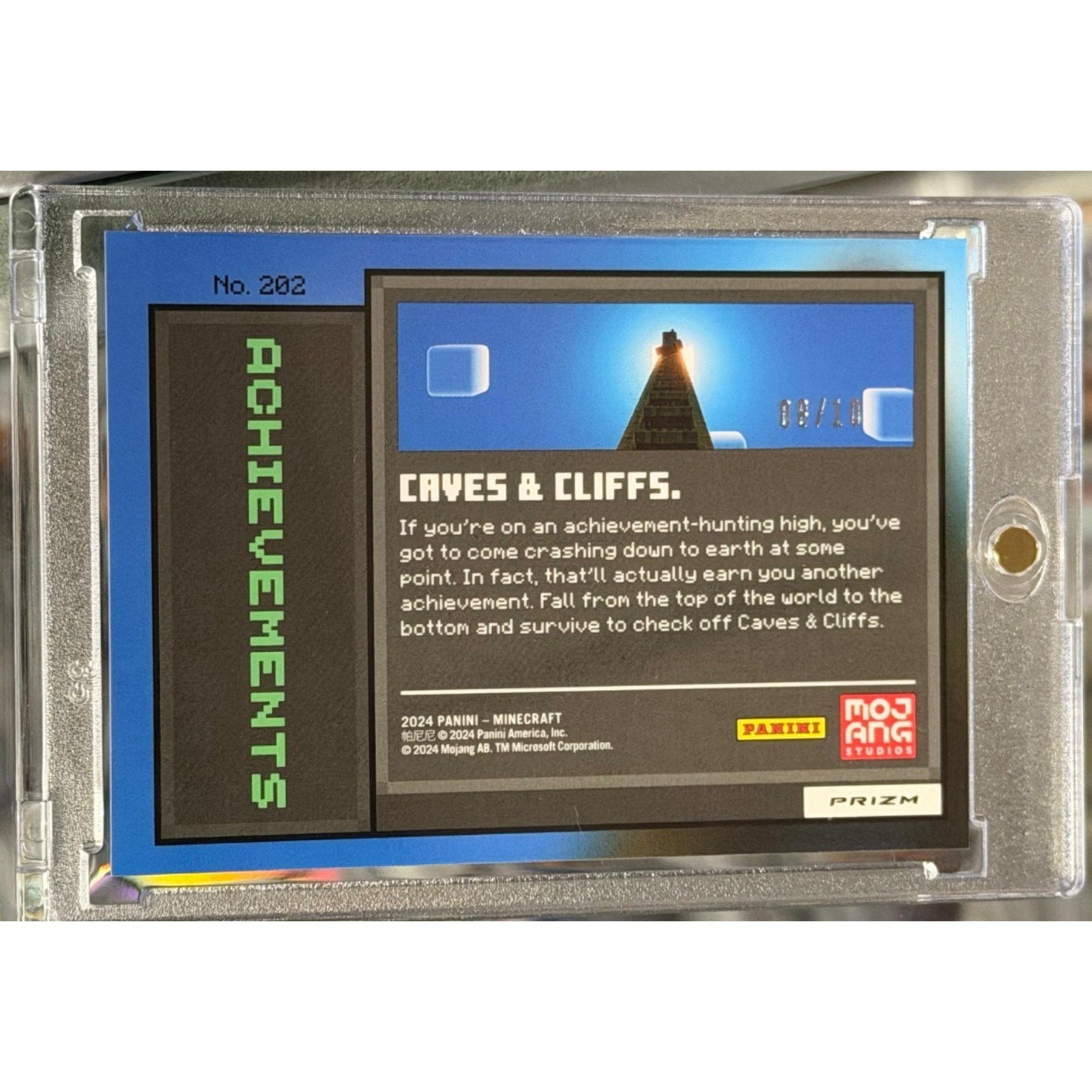 Close-up of serial numbering and card back details on 2024 Panini Prizm Minecraft Blue Prizm Achievement SSP