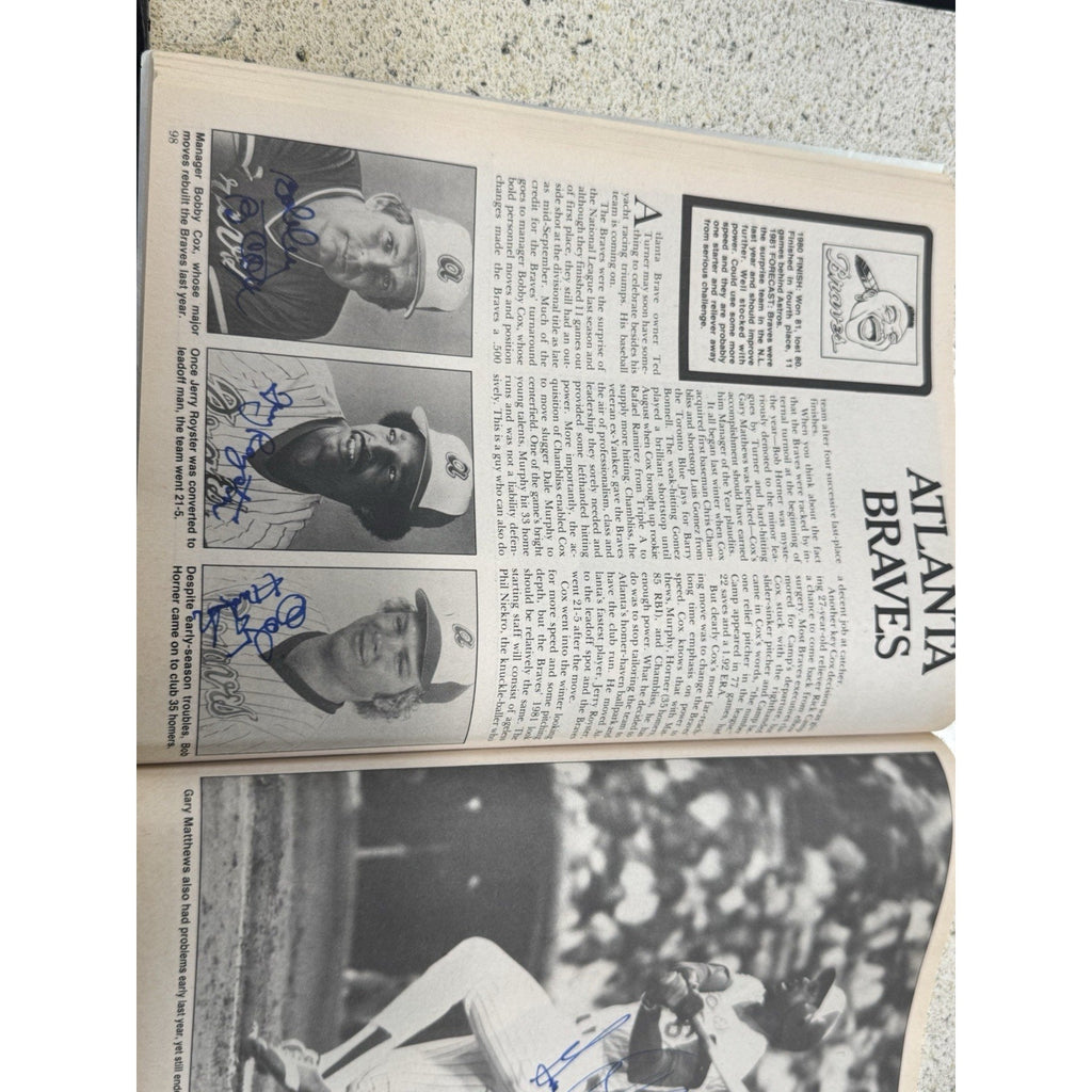 Inside page from vintage baseball publication showing signed player content and MLB articles