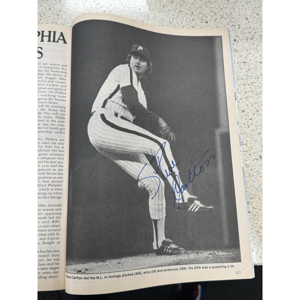 Classic MLB pitching photograph featured inside signed vintage baseball magazine