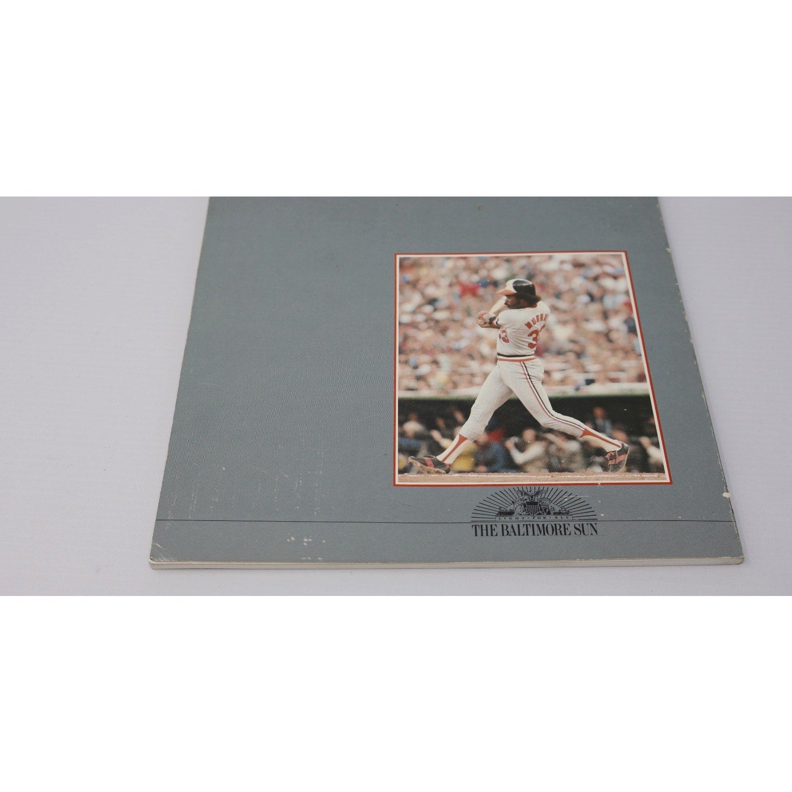 Side angle view of vintage Baltimore Orioles championship publication