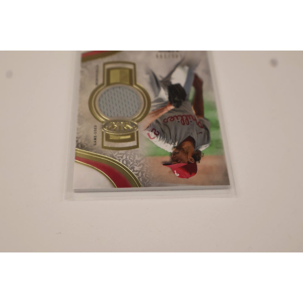 Close-up image of Aaron Nola Topps Tier One memorabilia relic patch and premium card design
