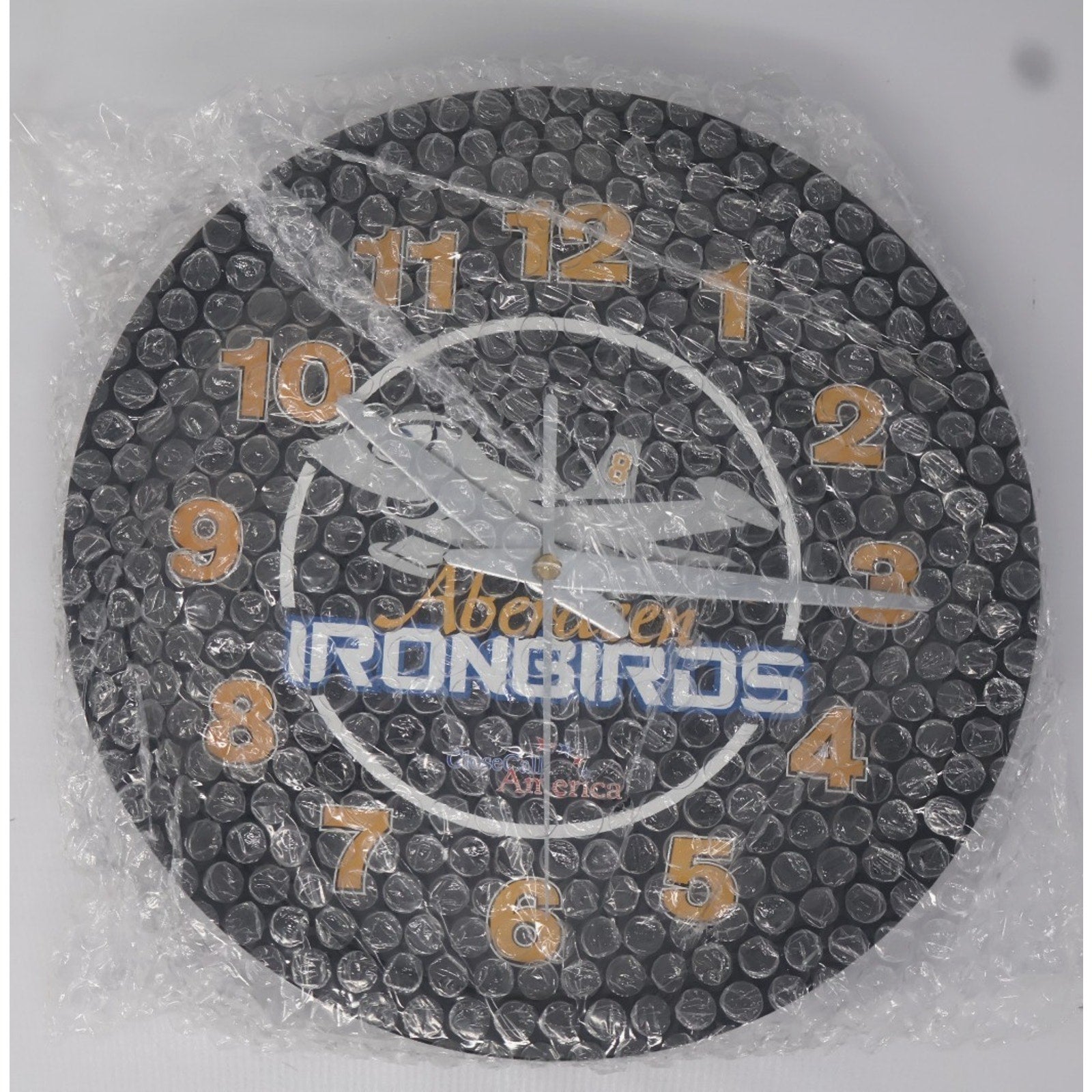 Aberdeen IronBirds wall clock sealed in protective packaging with visible team branding