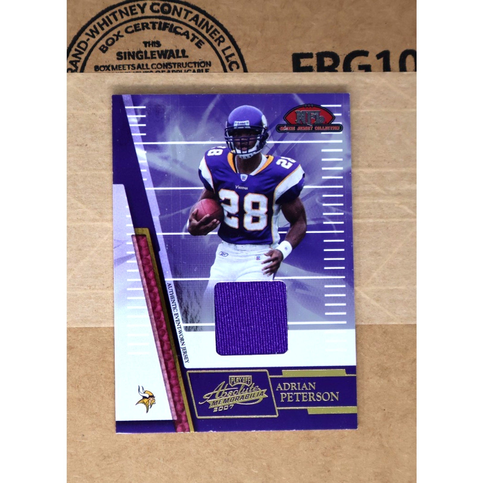2007 Playoff Absolute Memorabilia Adrian Peterson rookie jersey patch card #RJC-18 featuring Minnesota Vikings memorabilia
