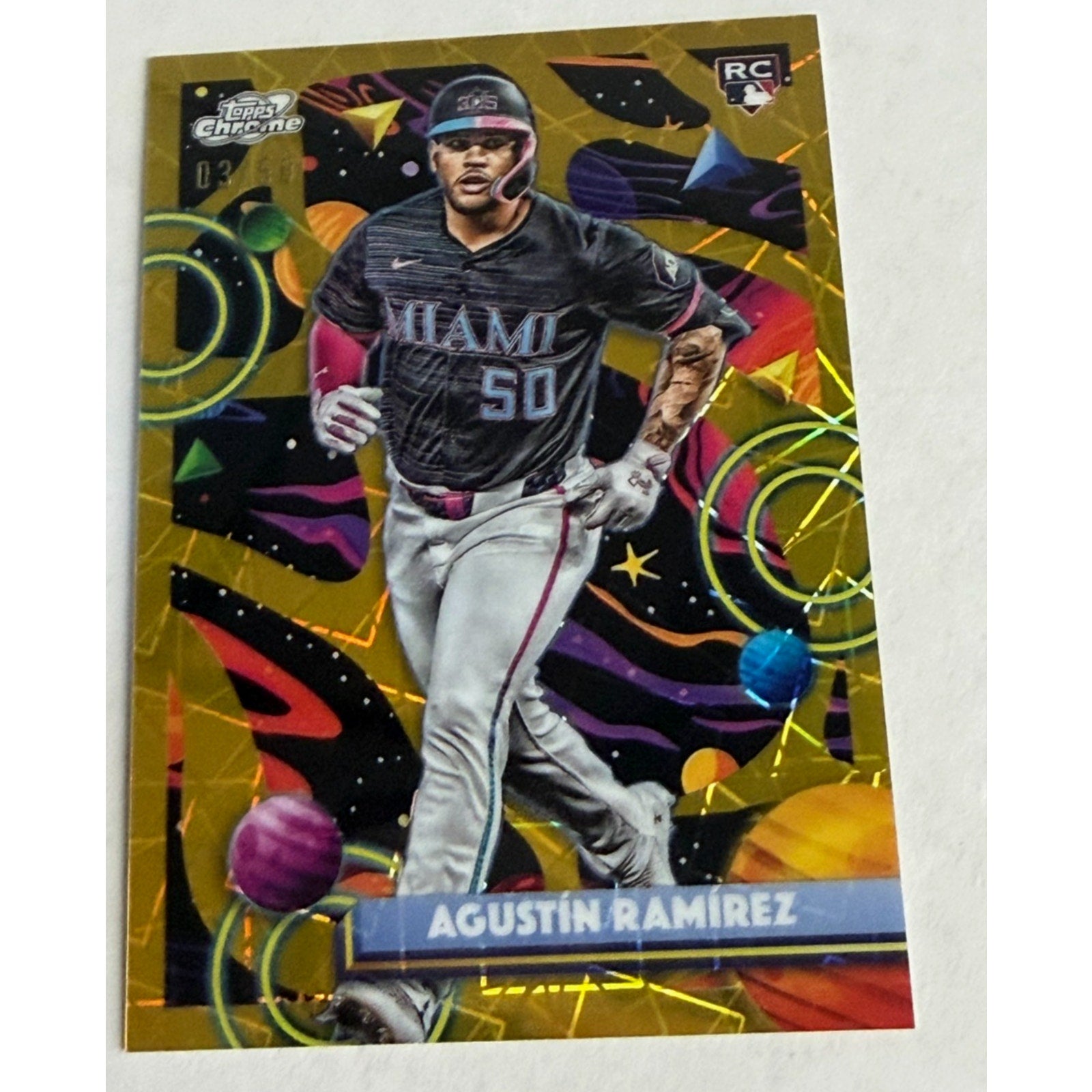 Baseball trading card of Agustin Ramirez with colorful design elements on a white background