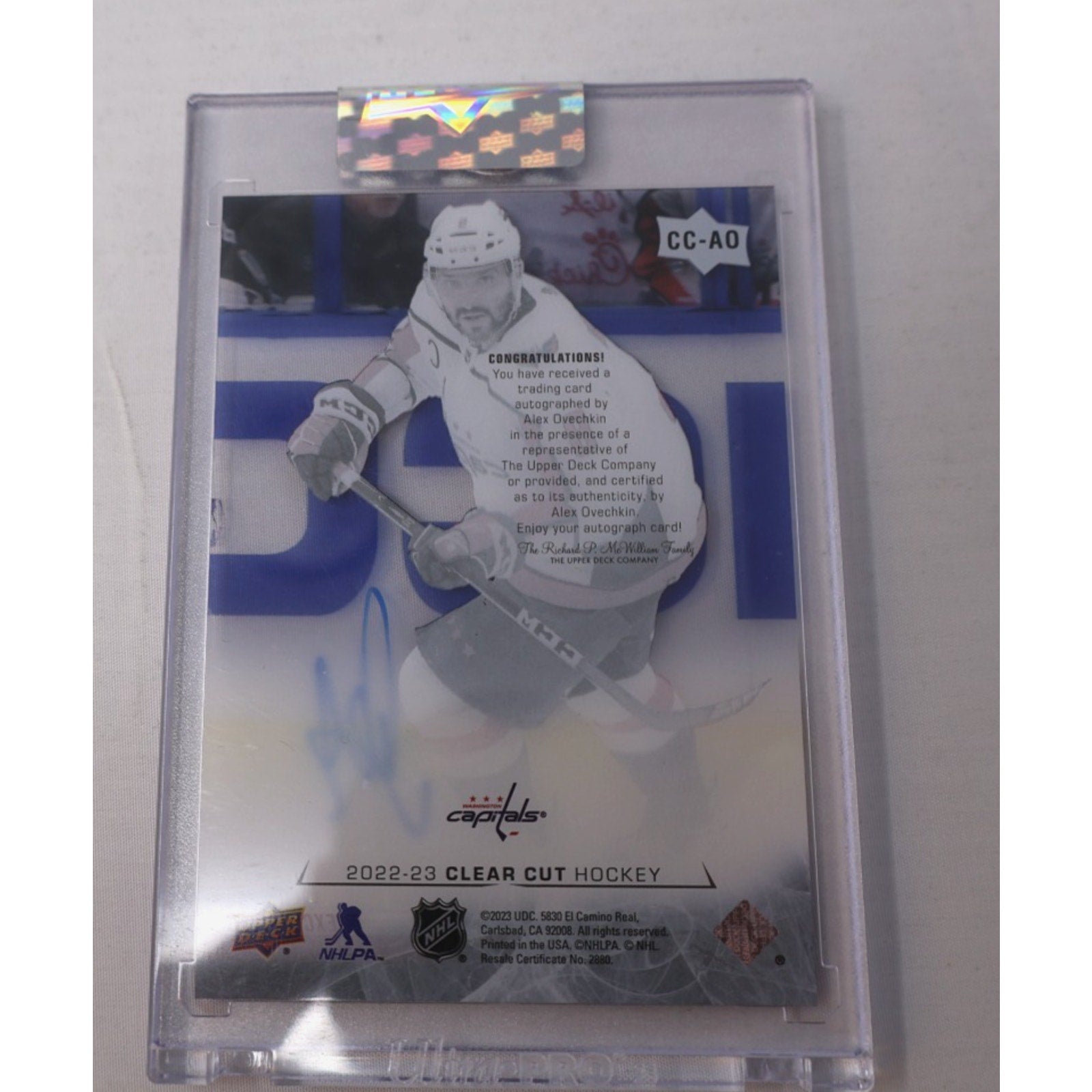 Front angled view of Alex Ovechkin Clear Cut autograph card with on-card blue ink signature