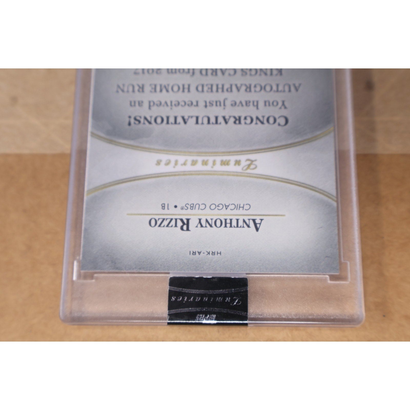 Bottom detail view of Anthony Rizzo 2017 Home Run Kings autograph card in protective holder
