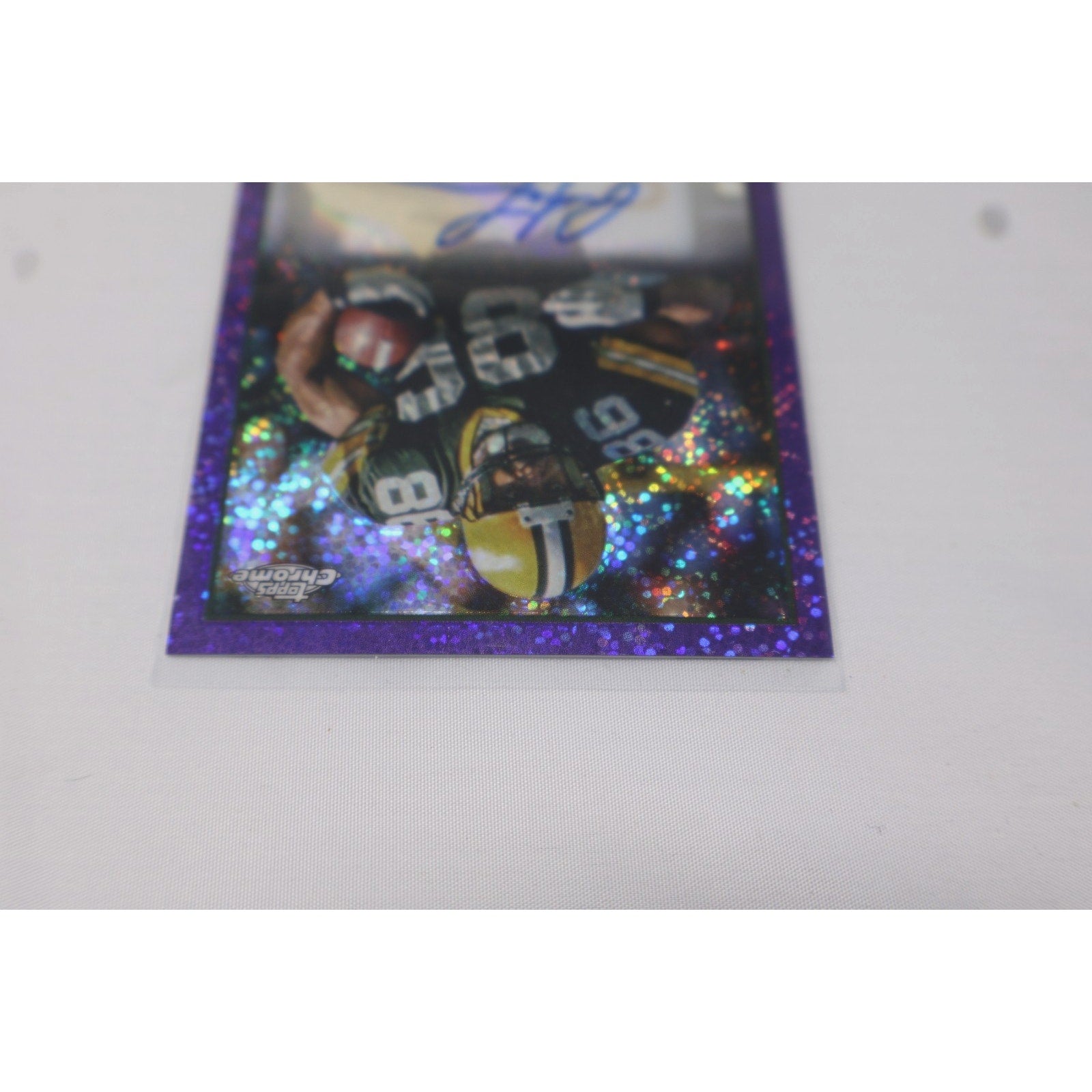 Close-up of Antonio Freeman autograph on 2024 Topps Chrome Composite Purple Speckle card collectible