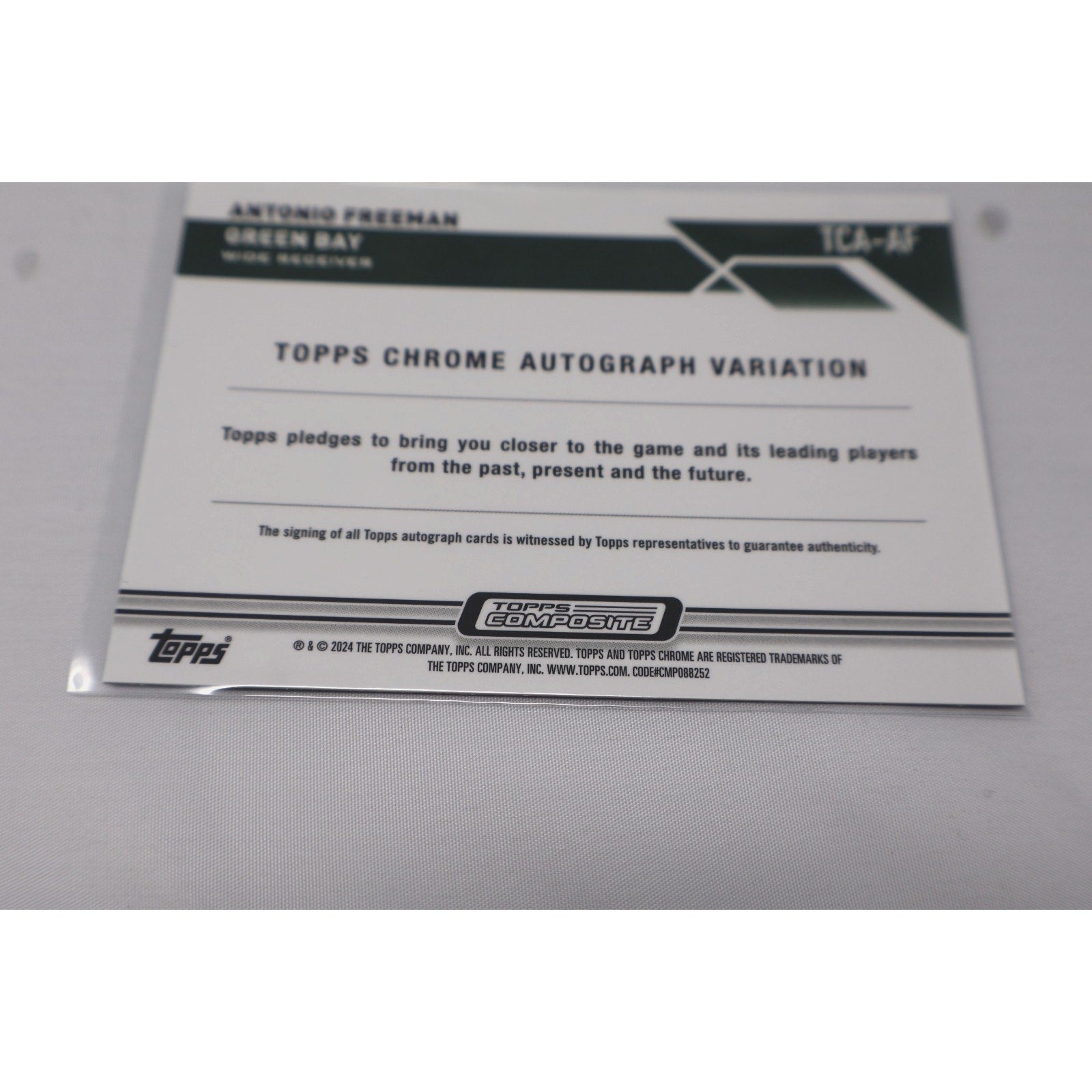 Rear view of Antonio Freeman 2024 Topps Chrome Composite autograph card with official NFL card information