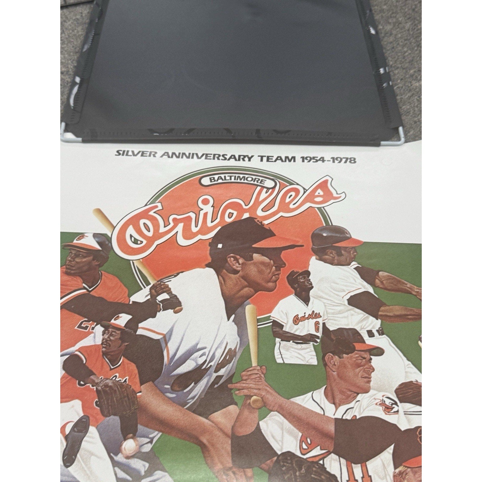 Angled view of rare Baltimore Orioles 25th Silver Anniversary vintage poster commemorating the 1954 to 1978 team era