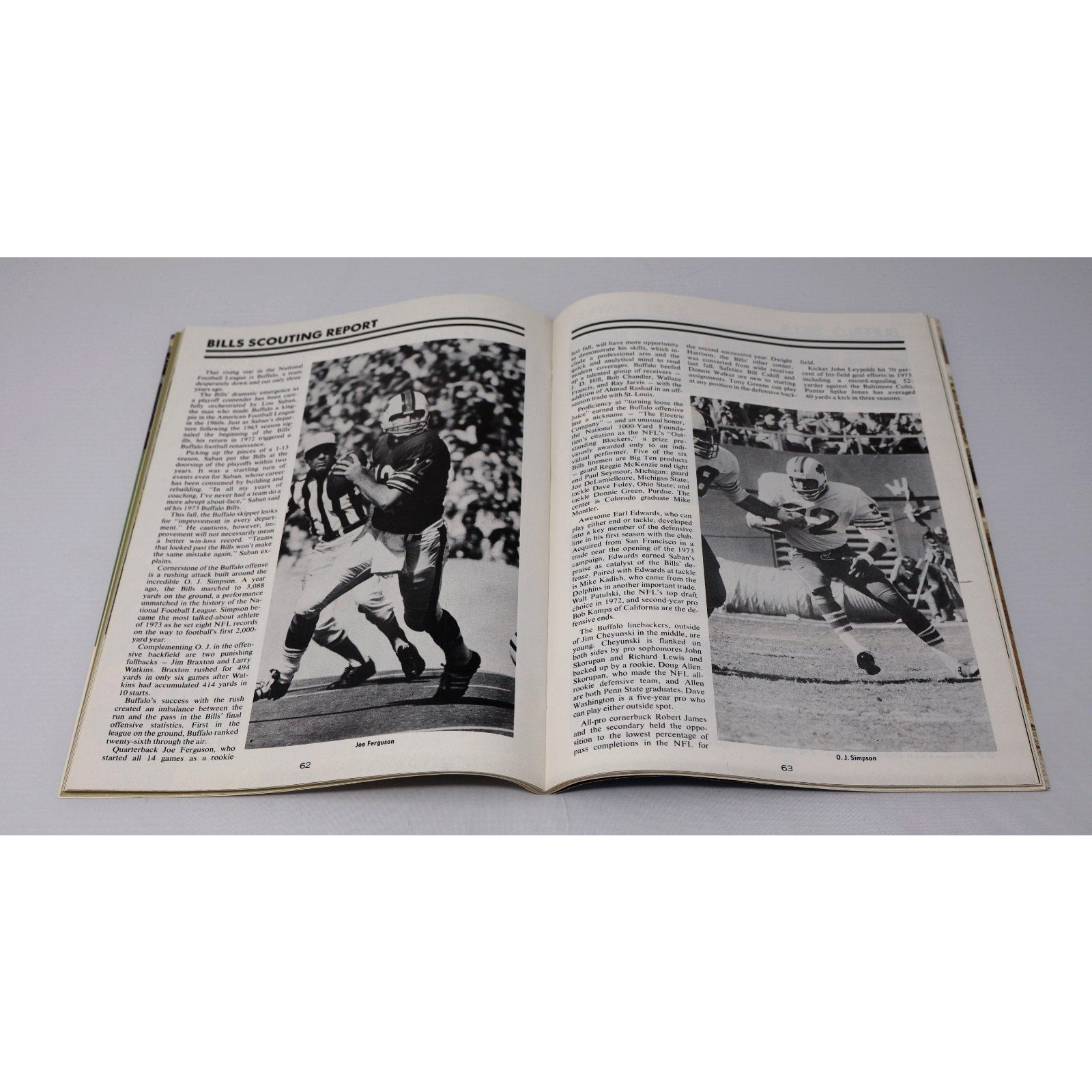 Inside pages of 1974 Baltimore Colts and Buffalo Bills Pro program showing vintage NFL articles and team content