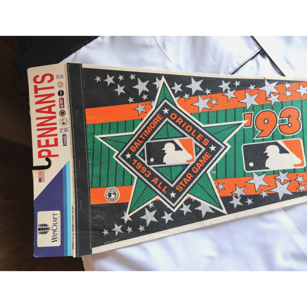 Close-up of 1993 MLB All-Star Game artwork and Orioles-themed graphics on pennant