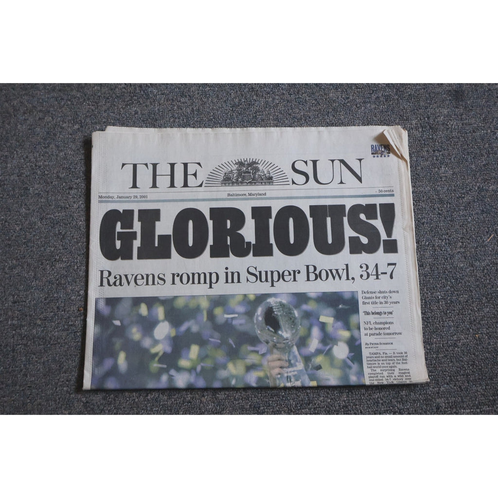 Baltimore Ravens 2001 Super Bowl Champions newspaper front page from The Baltimore Sun featuring GLORIOUS headline