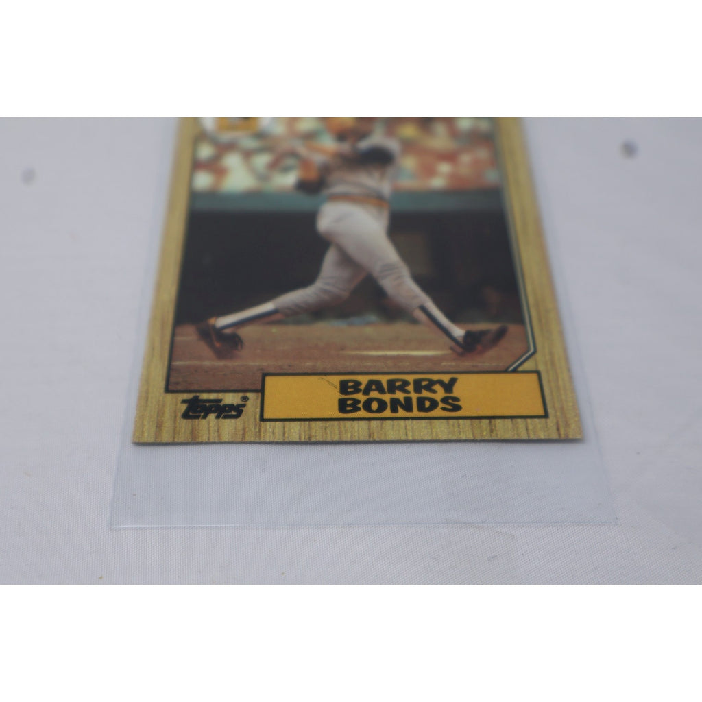 Angled front view of 1987 Topps Barry Bonds rookie baseball card #320 on display