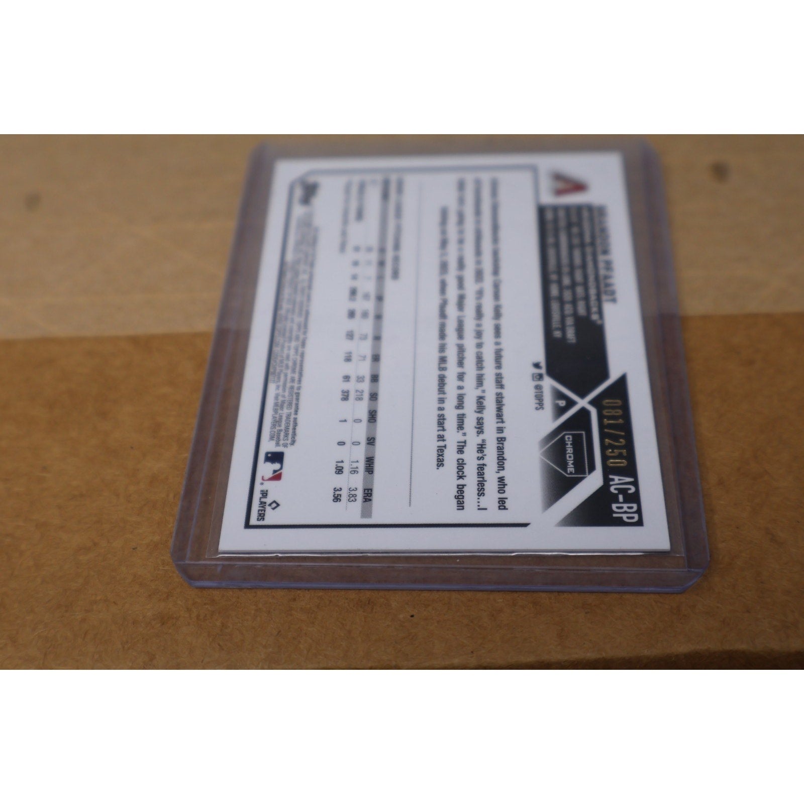 Rear angled view of Brandon Pfaadt rookie autograph refractor card from 2023 Topps Chrome Baseball