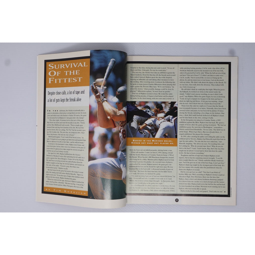 Inside spread of Sports Illustrated collectors edition featuring Cal Ripken Jr article and photos