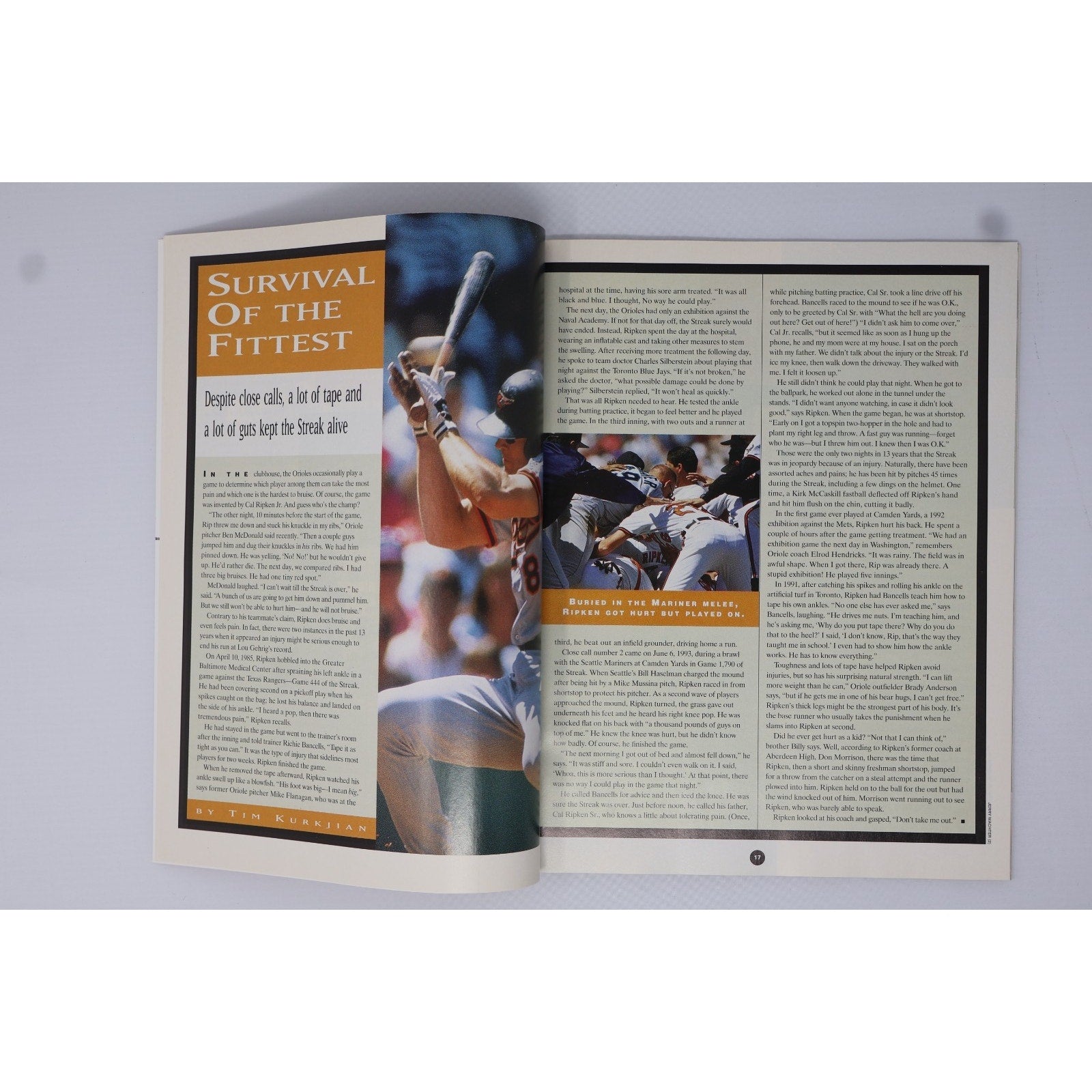 Inside spread of Sports Illustrated collectors edition featuring Cal Ripken Jr article and photos