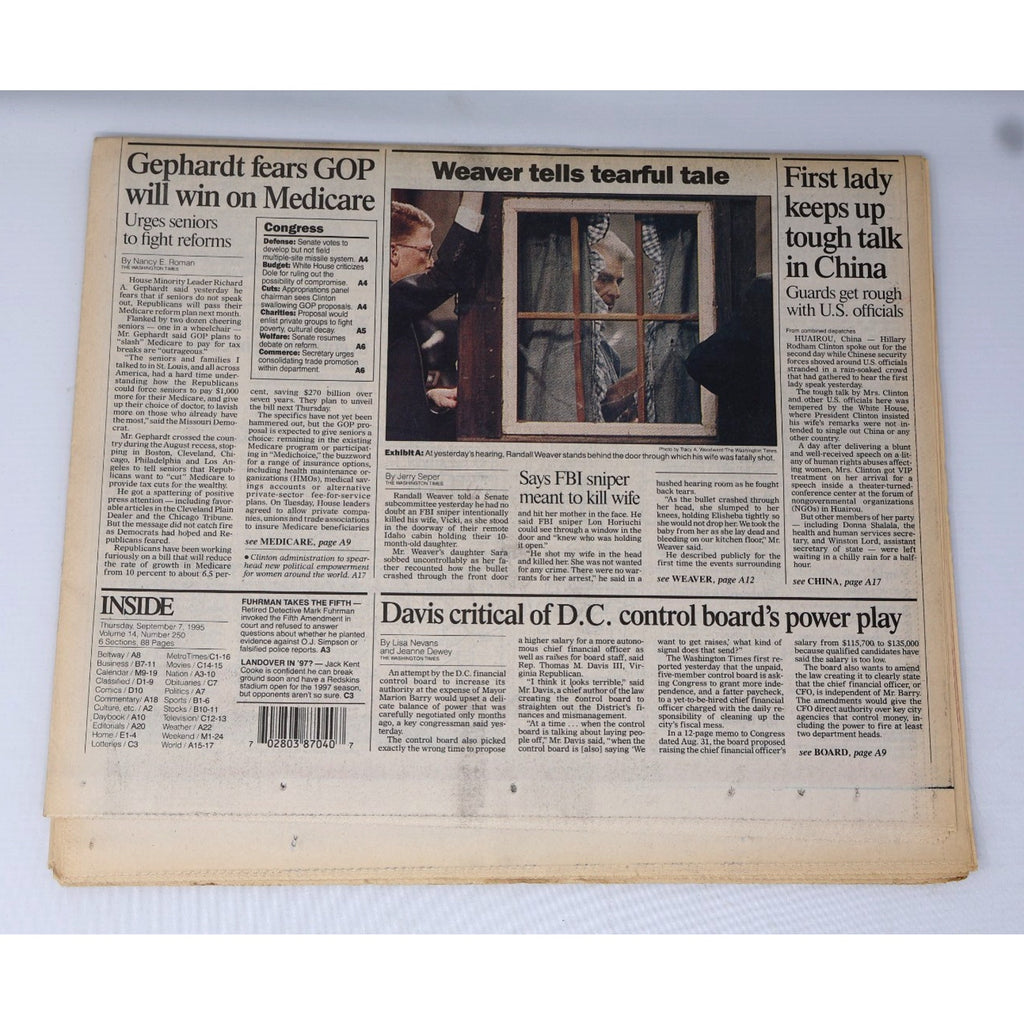 Inside newspaper article pages featuring Cal Ripken Jr coverage and historic MLB moments