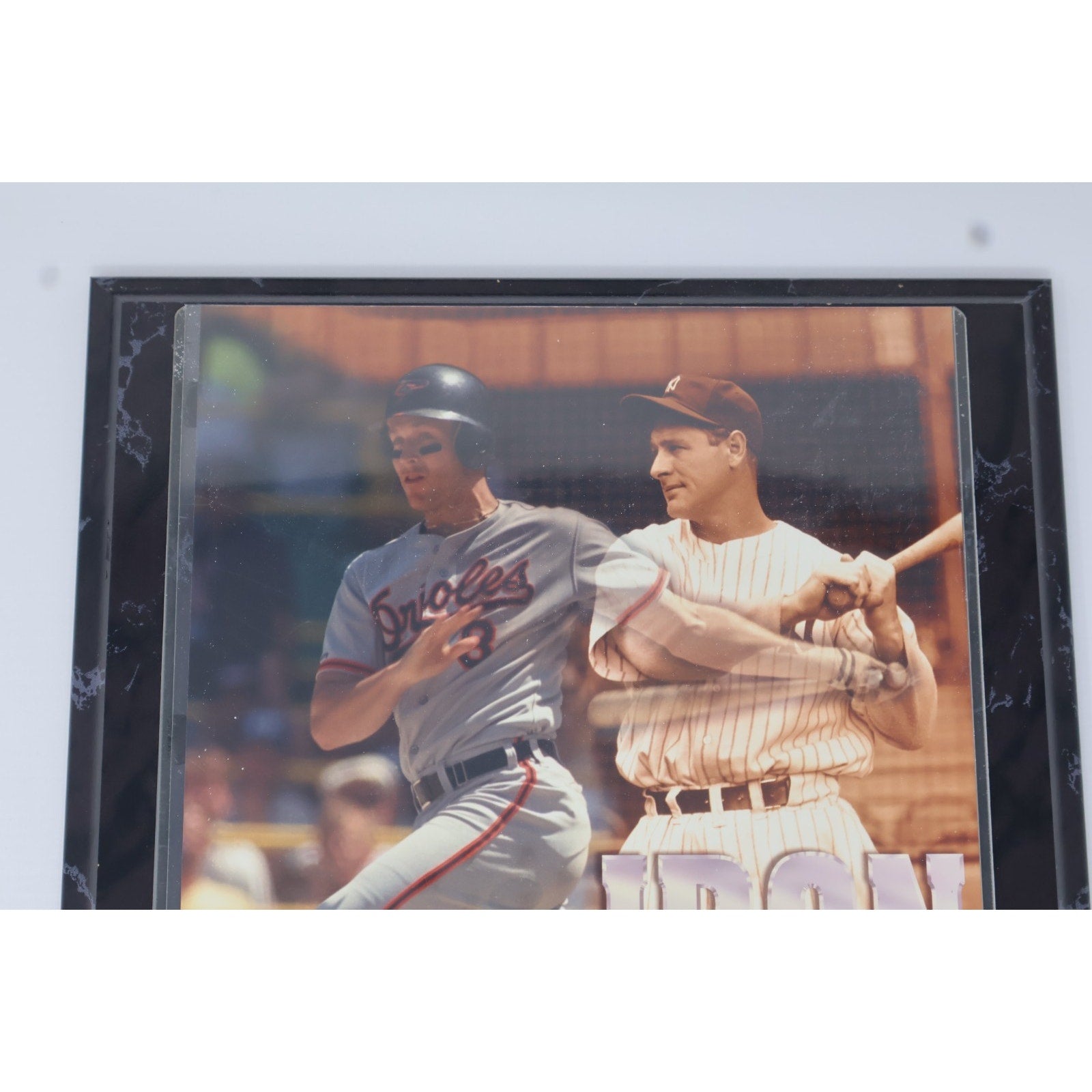 Close-up front view of Iron Men Baltimore Orioles plaque featuring Cal Ripken Jr and Lou Gehrig imagery