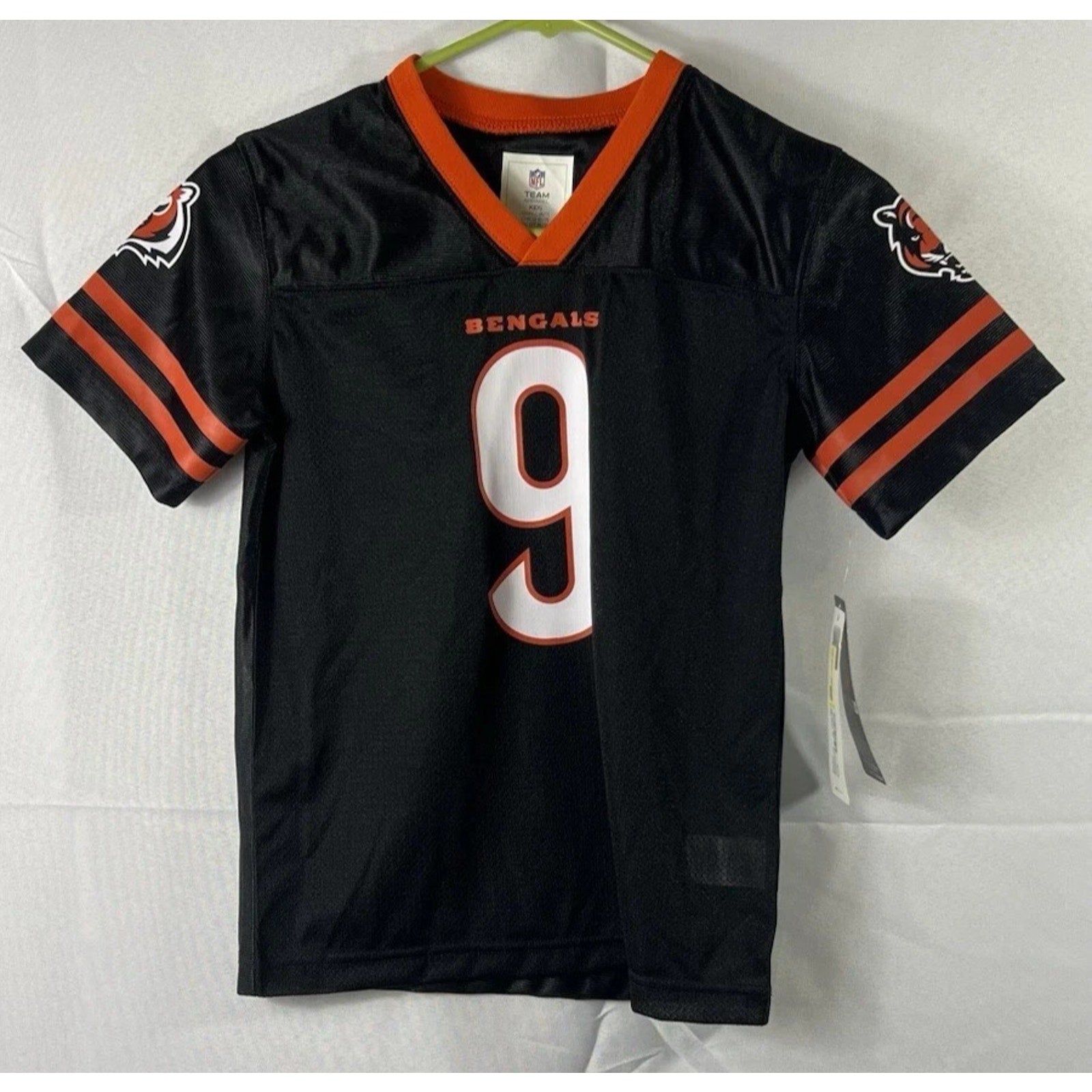 Cincinnati Bengals Joe Burrow youth home jersey in black with orange accents and number 9