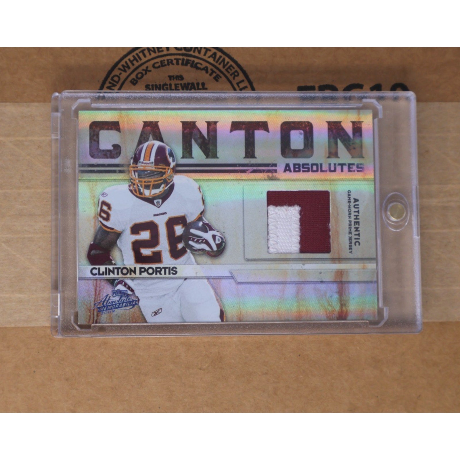 2009 Panini Absolute Clinton Portis Canton Absolutes game used jersey card numbered 17 of 50 featuring Washington Redskins memorabilia