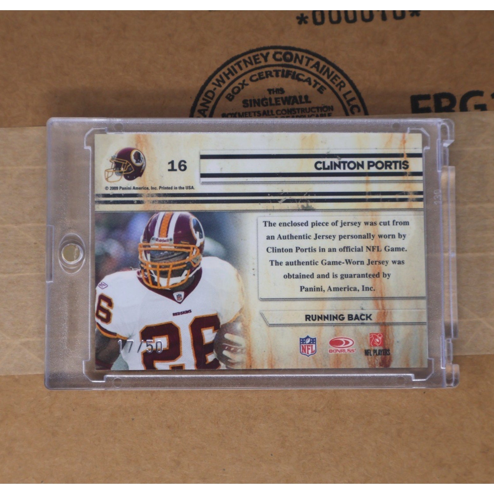 Back of 2009 Panini Absolute Clinton Portis game used jersey card serial numbered 17/50 from Canton Absolutes set