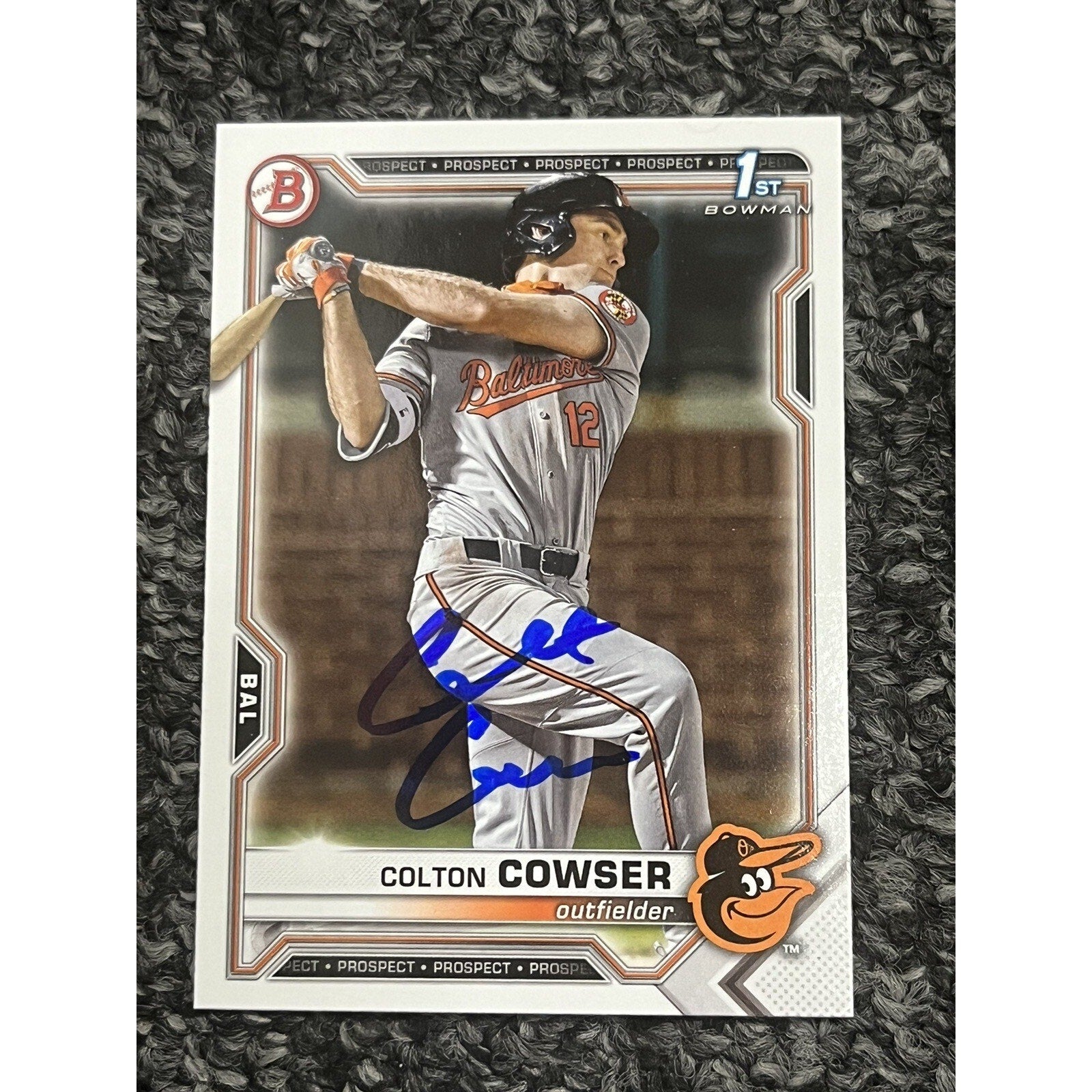Angled front view of Colton Cowser 2021 Bowman Draft auto rookie card