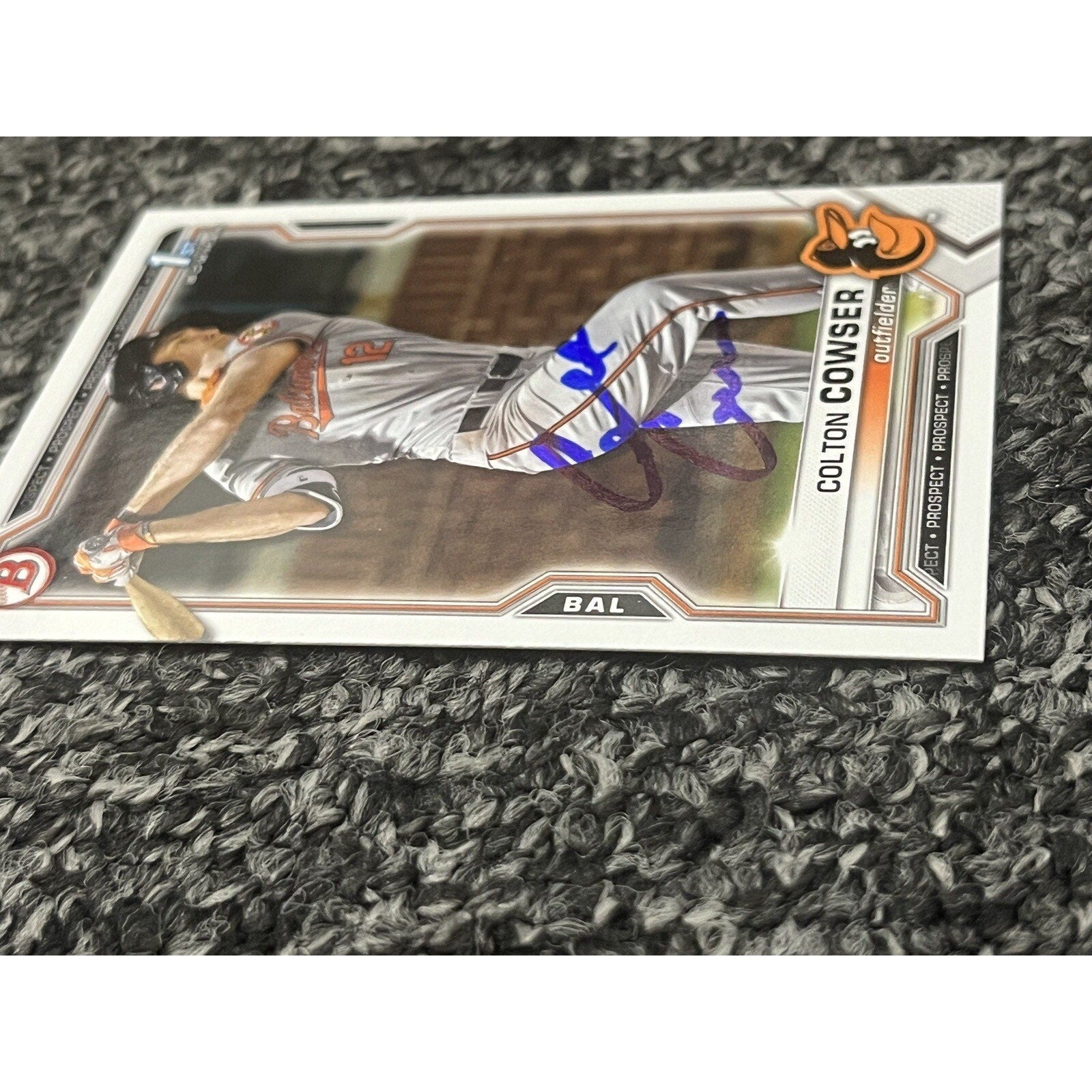 Top angled view of Colton Cowser Bowman Draft rookie auto card