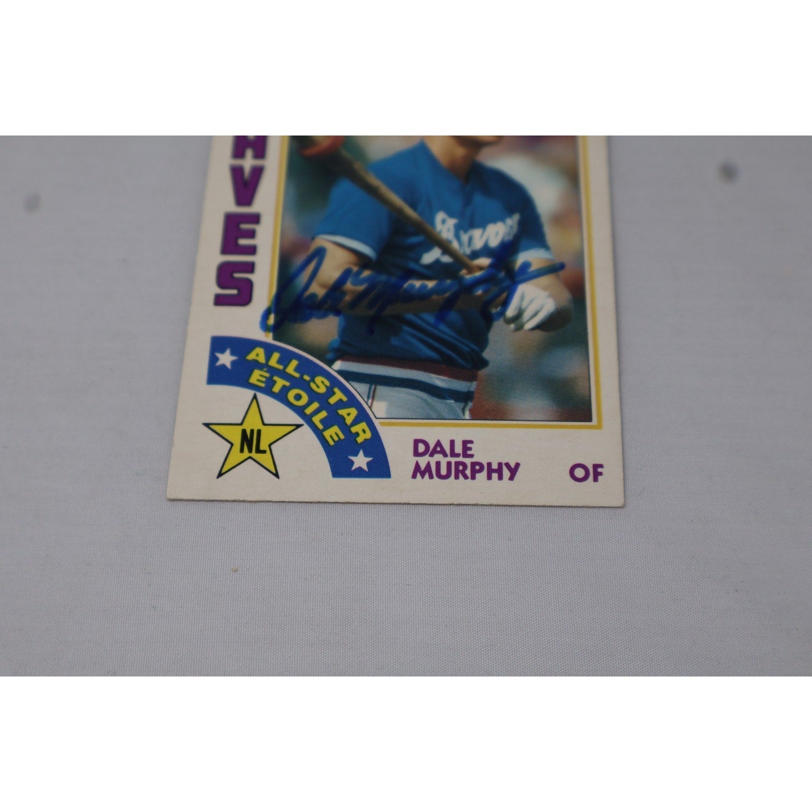 Close-up angled view of Dale Murphy autograph on front of card