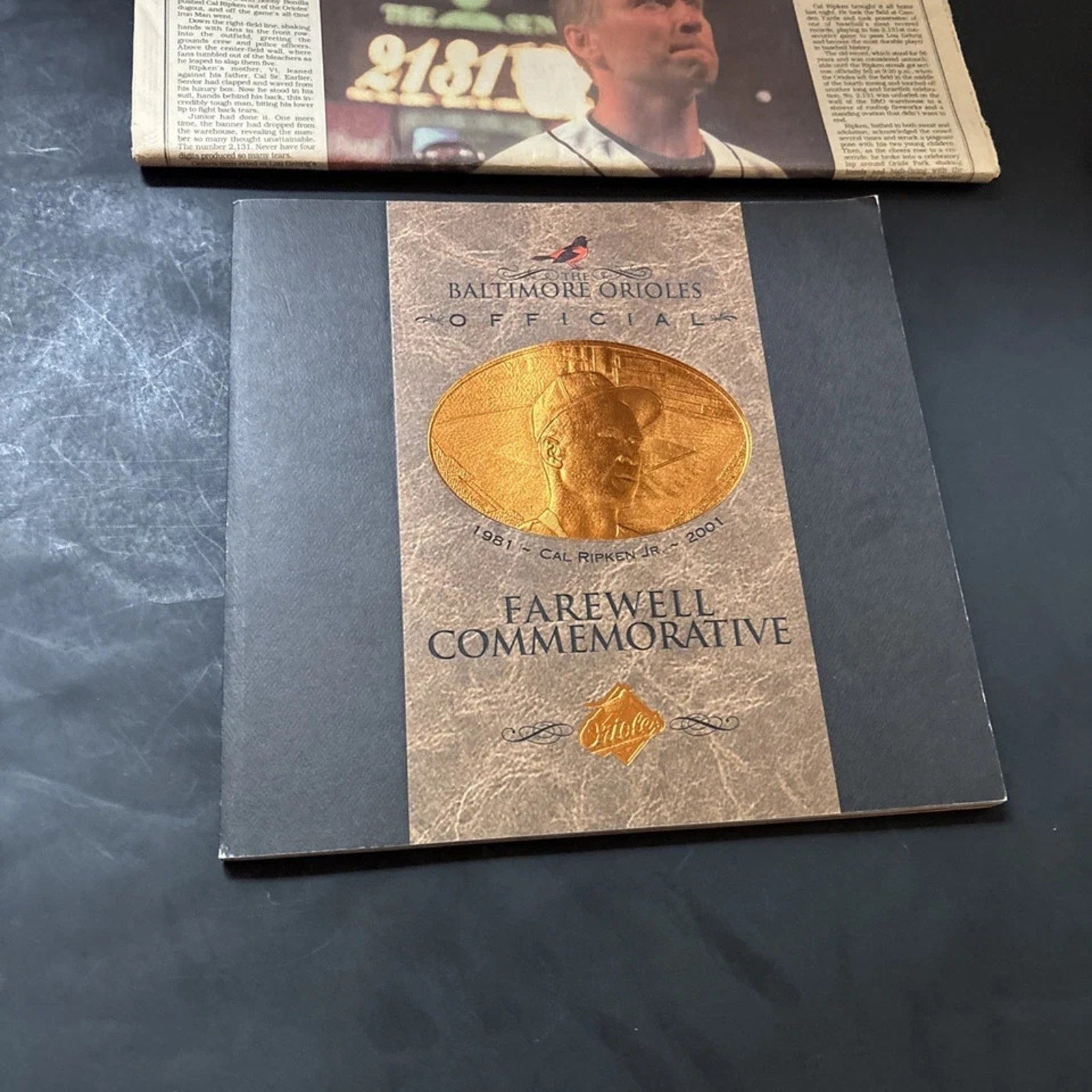 Front cover of Cal Ripken Jr commemorative collectible book honoring Orioles baseball history