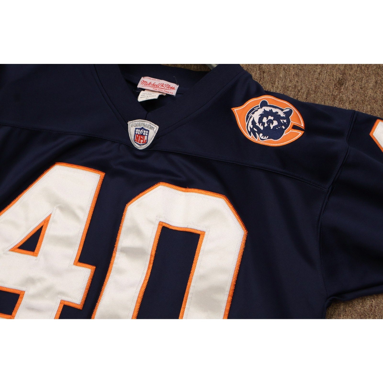 Upper back view of Gale Sayers Mitchell and Ness throwback jersey