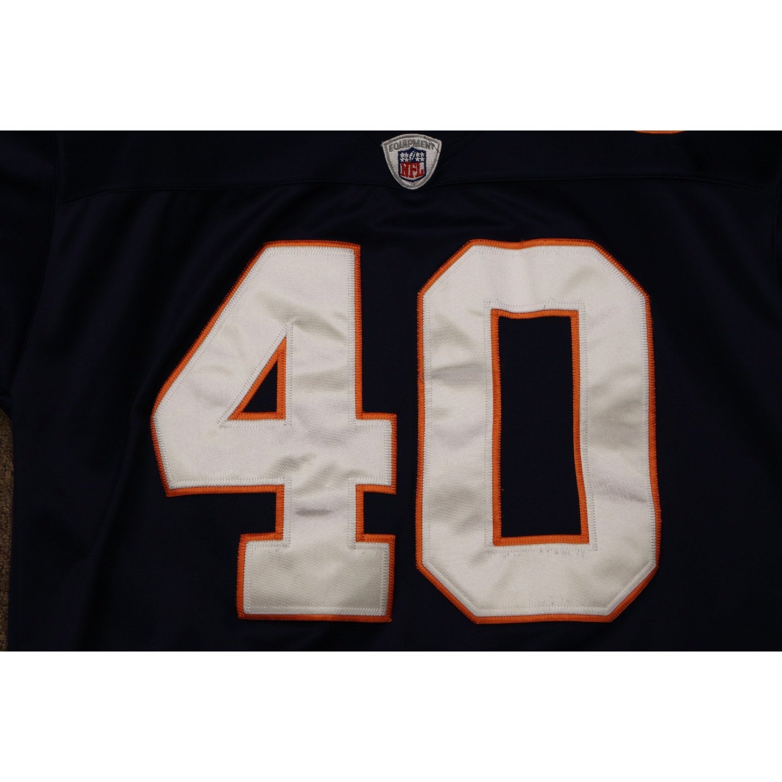 Close-up of stitched number 40 on vintage Chicago Bears jersey