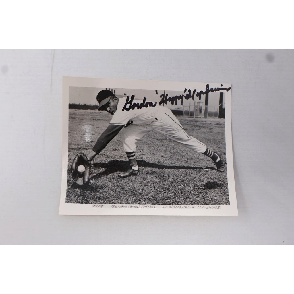 Signed black-and-white photo of Gordon “Hoppy” Hopkins pitching for the Indianapolis Clowns Negro Leagues baseball team