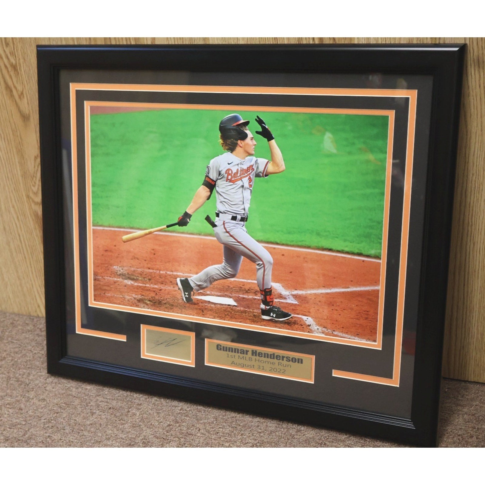 Framed Gunnar Henderson Baltimore Orioles first career home run commemorative display with photo and engraved plaques