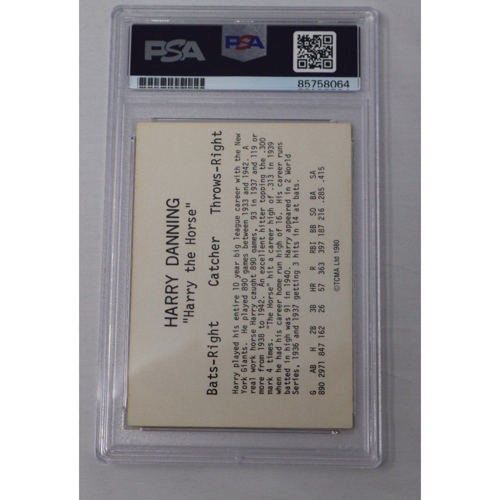 Back view of the Harry Danning 1980 TCMA autographed card inside PSA holder showing player biography, card details, and PSA authentication information